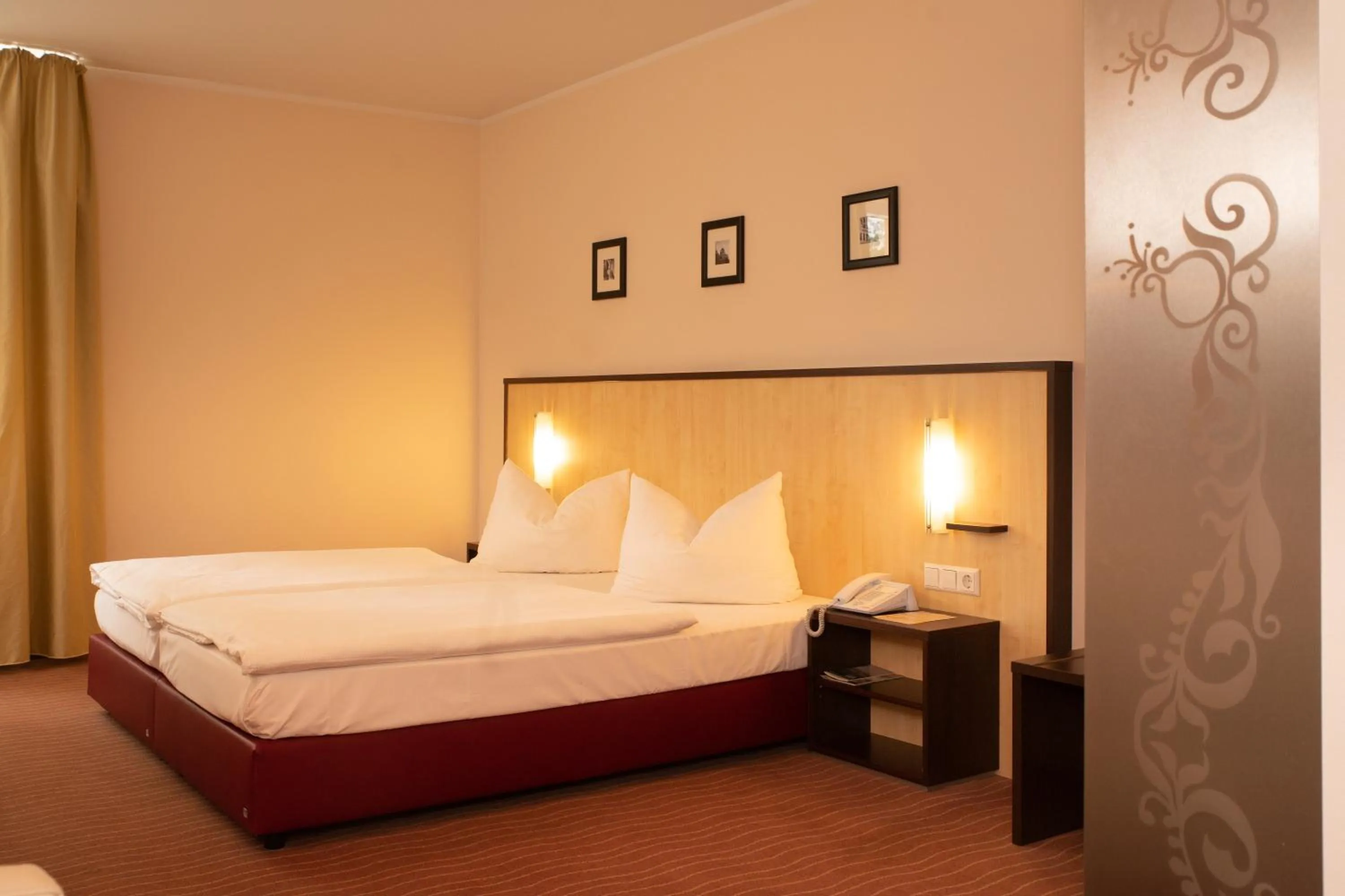 Photo of the whole room, Bed in Bergwirtschaft Wilder Mann Hotel und Restaurant