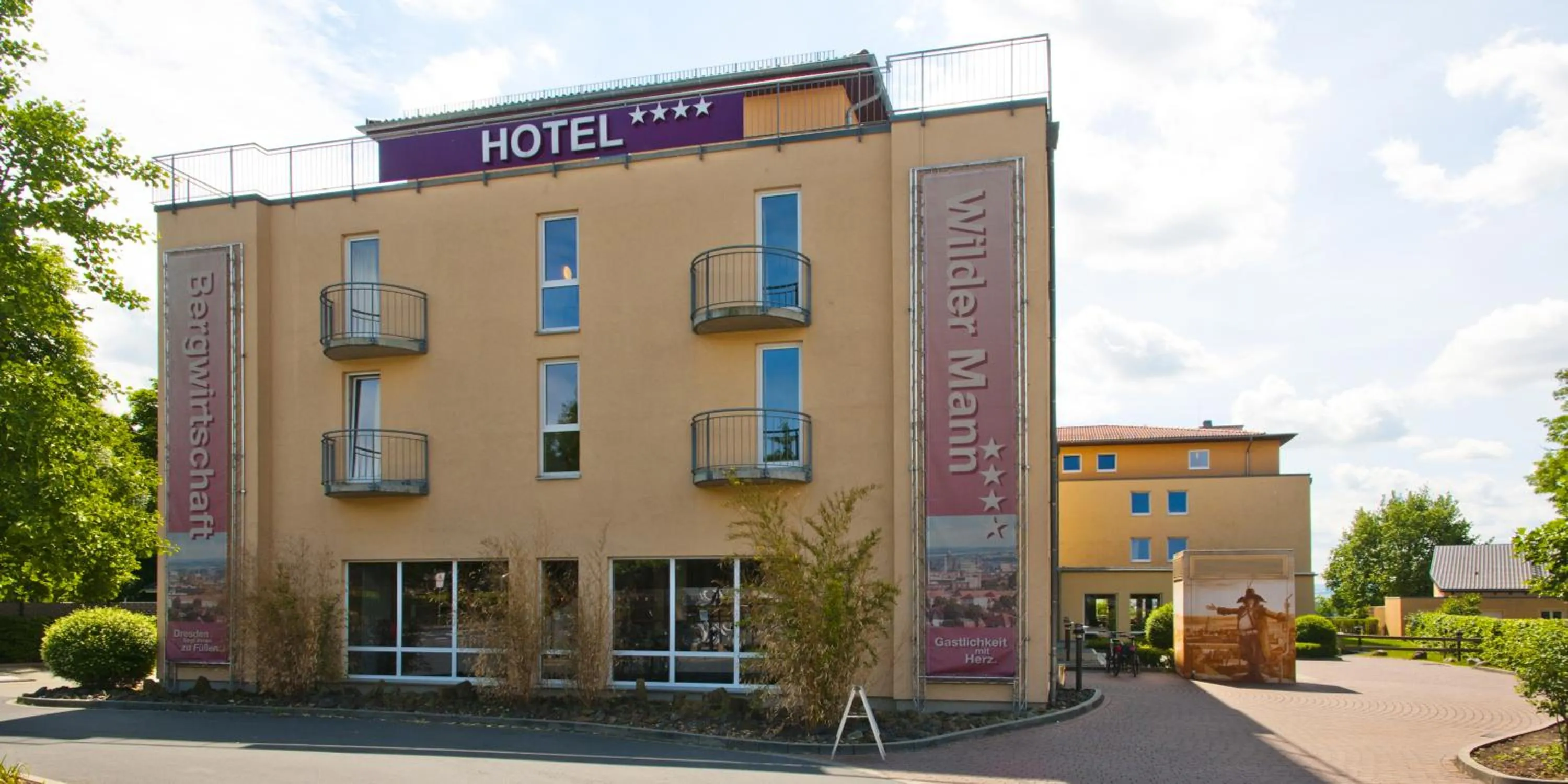 Property building in Bergwirtschaft Wilder Mann Hotel und Restaurant