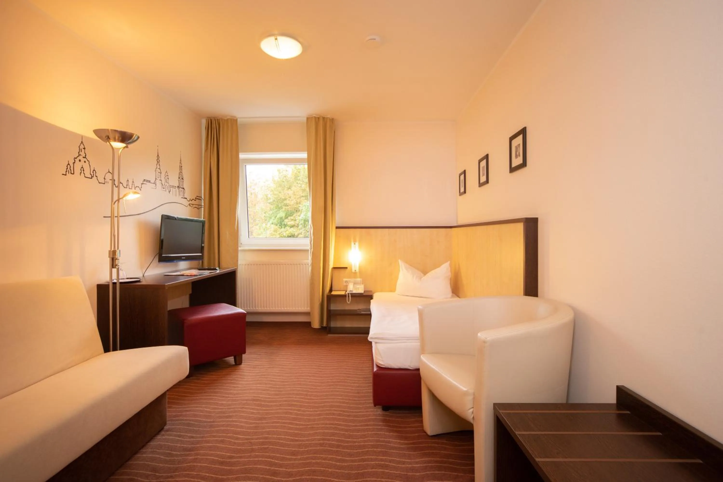 Photo of the whole room, Bed in Bergwirtschaft Wilder Mann Hotel und Restaurant