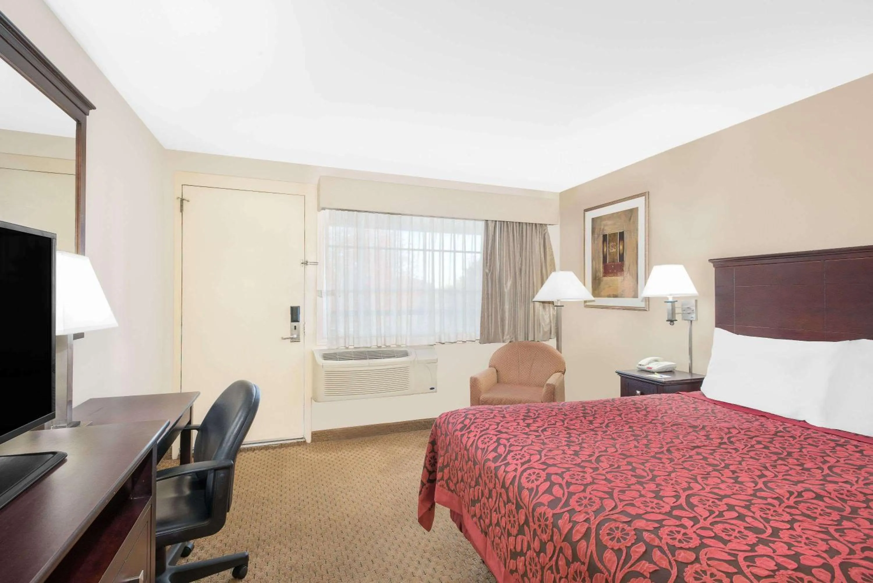 Photo of the whole room, Bed in Days Inn by Wyndham Springfield/Phil.Intl Airport