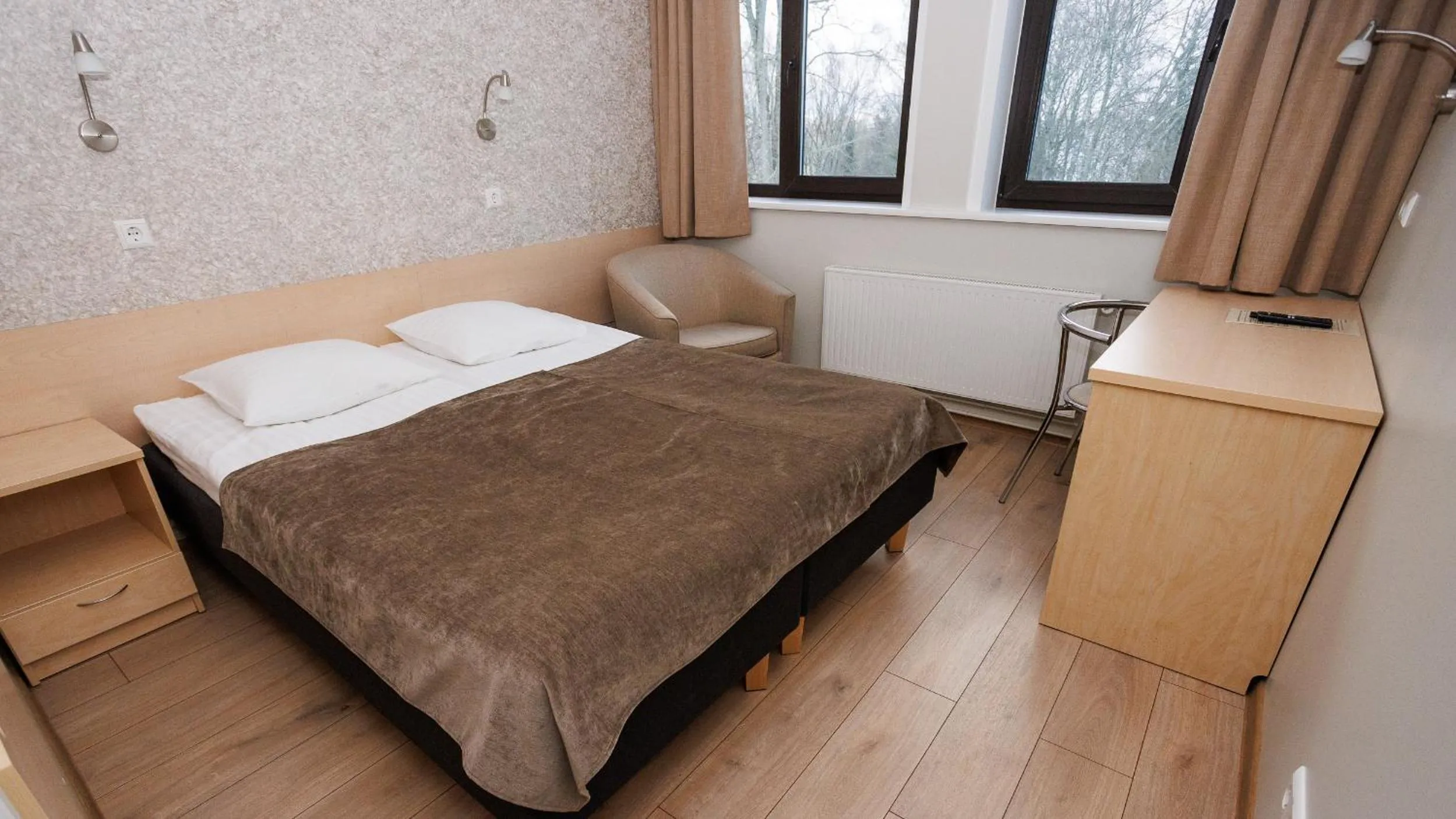 Bed in Hotel Karupesa