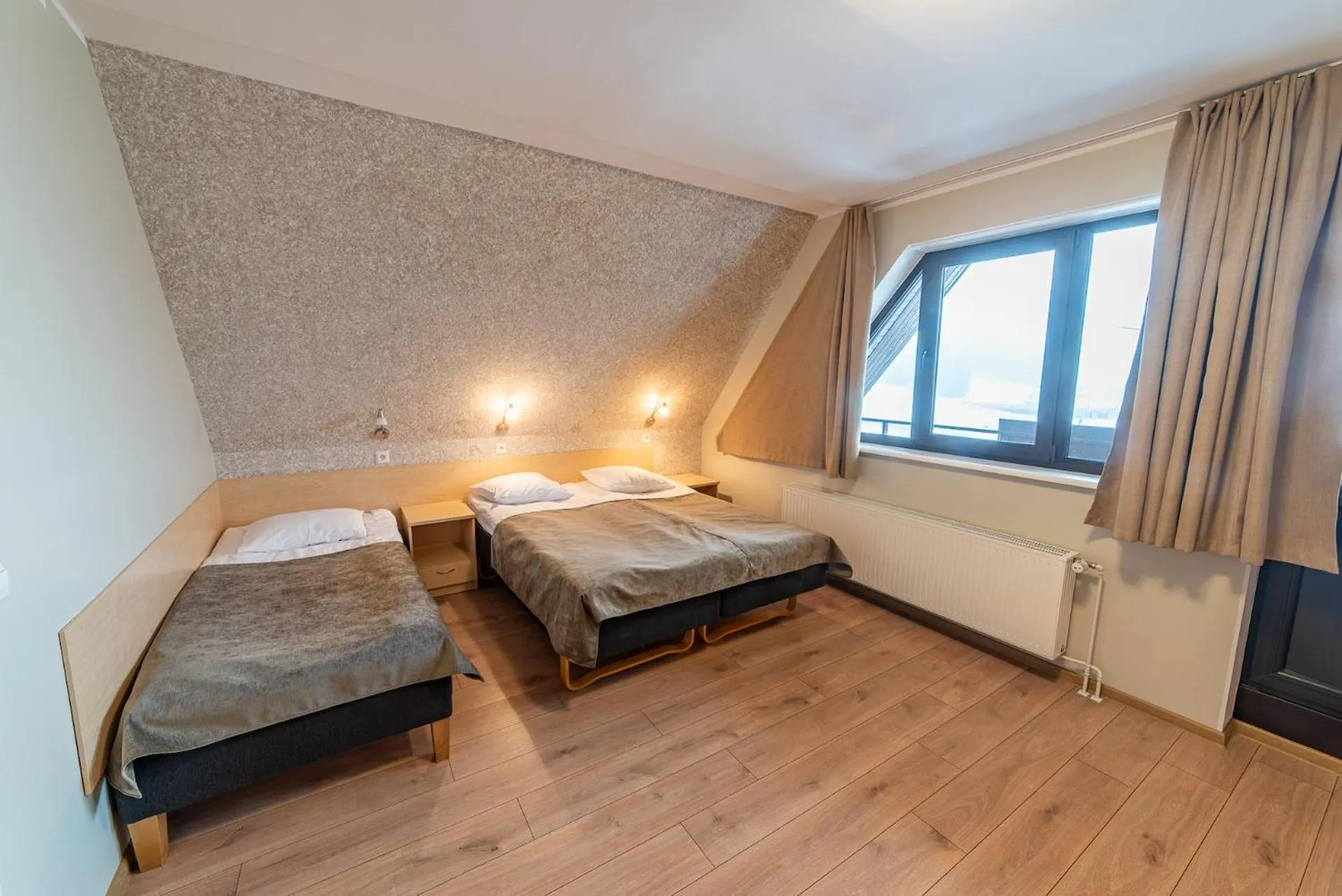 Bed in Hotel Karupesa