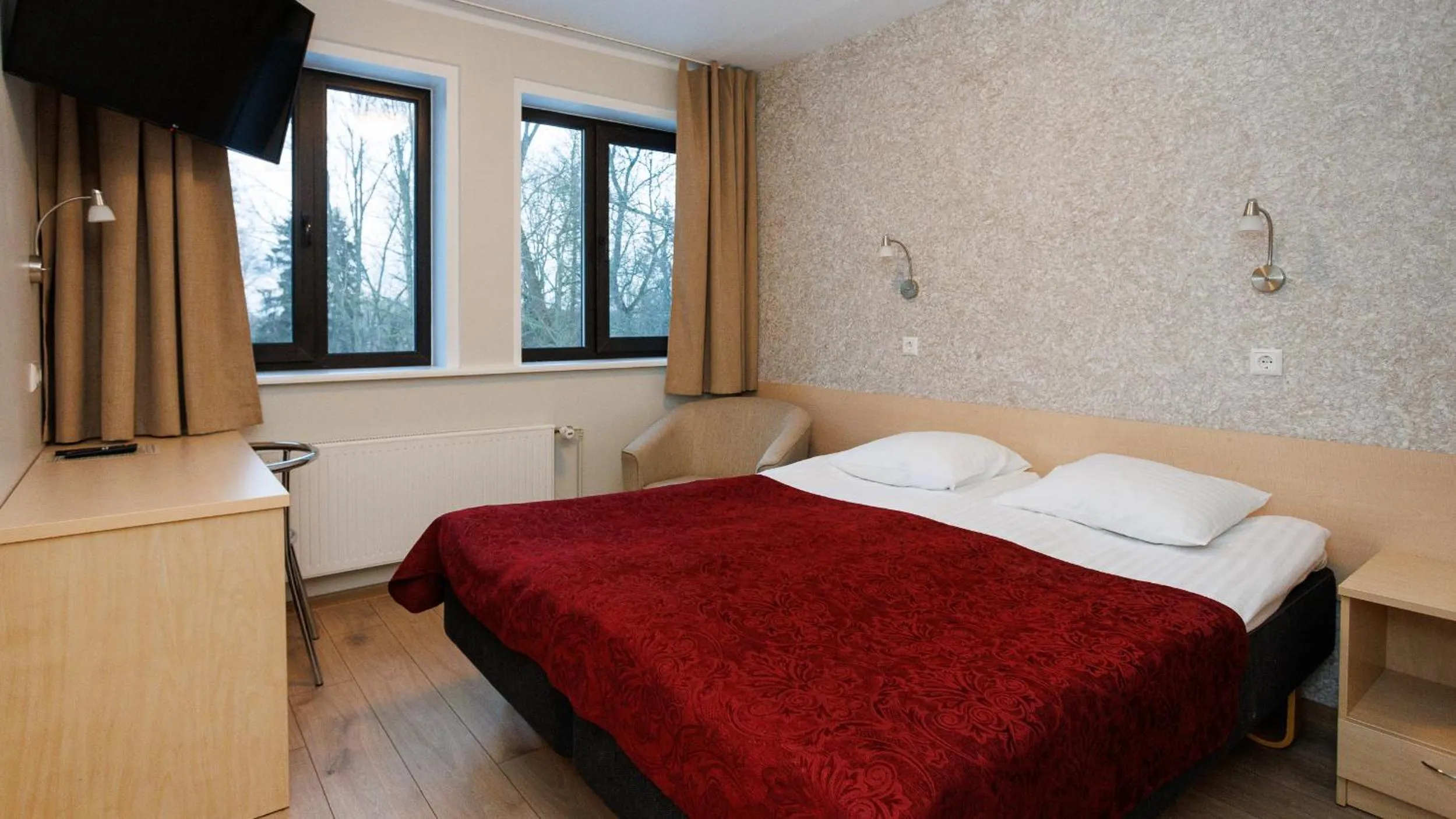 Bed in Hotel Karupesa