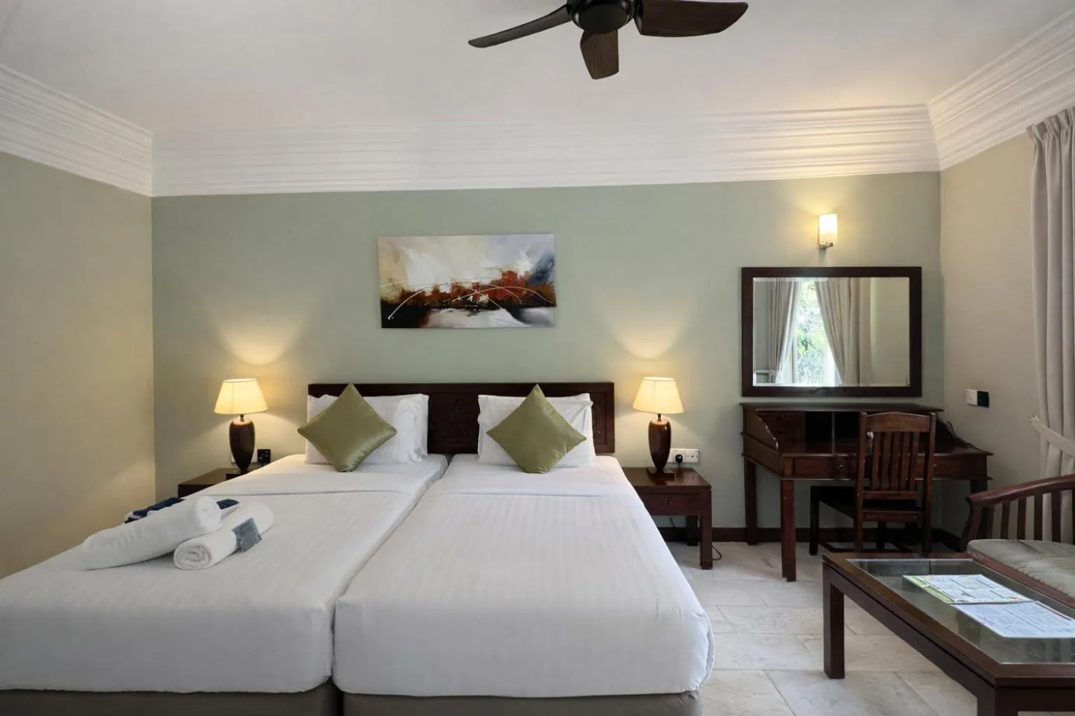 Bed in Frangipani Langkawi Resort