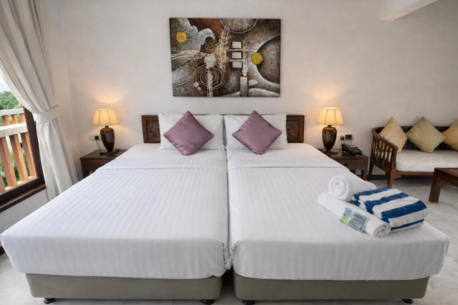 Bed in Frangipani Langkawi Resort