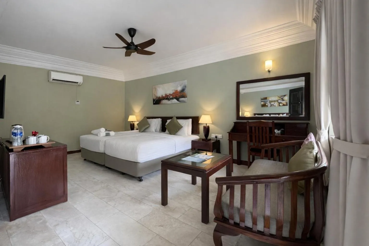 Bed in Frangipani Langkawi Resort