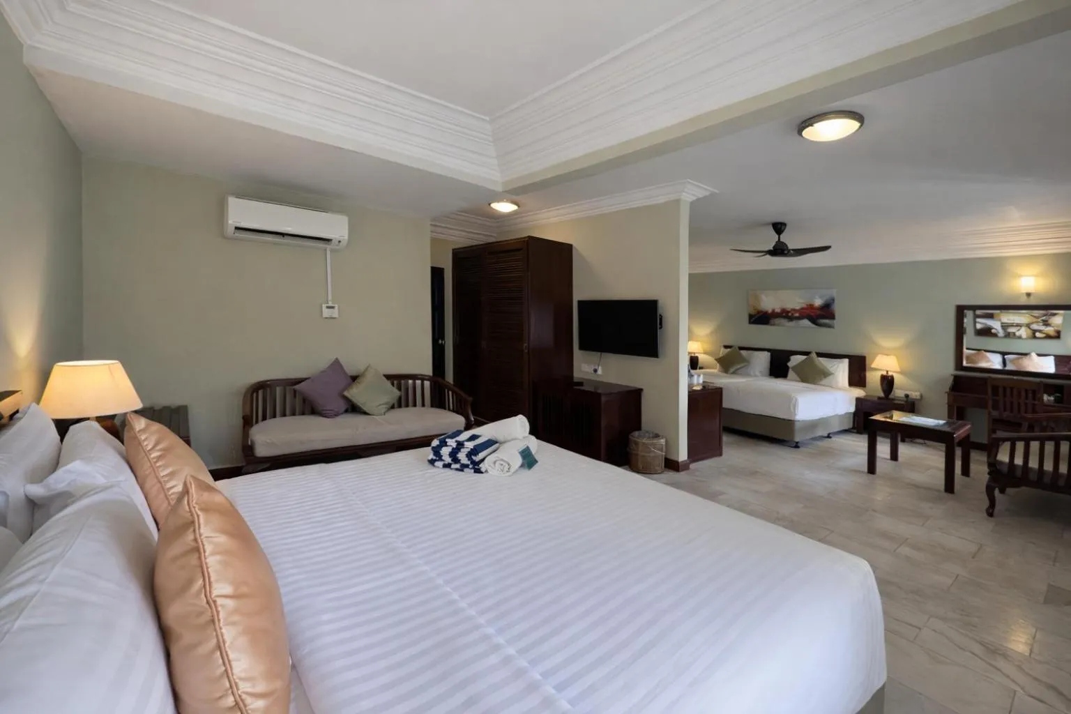 Bed in Frangipani Langkawi Resort