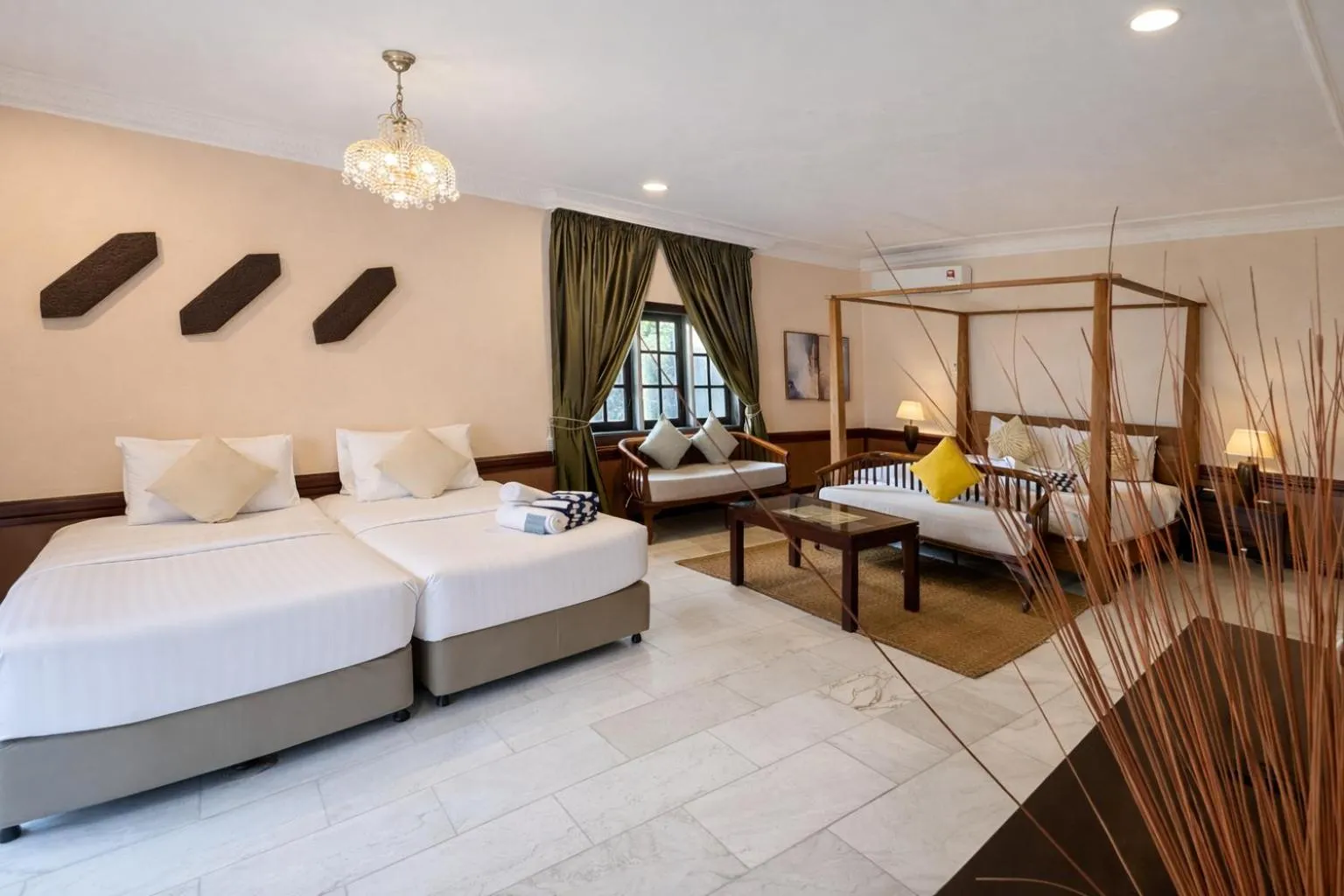 Bed in Frangipani Langkawi Resort