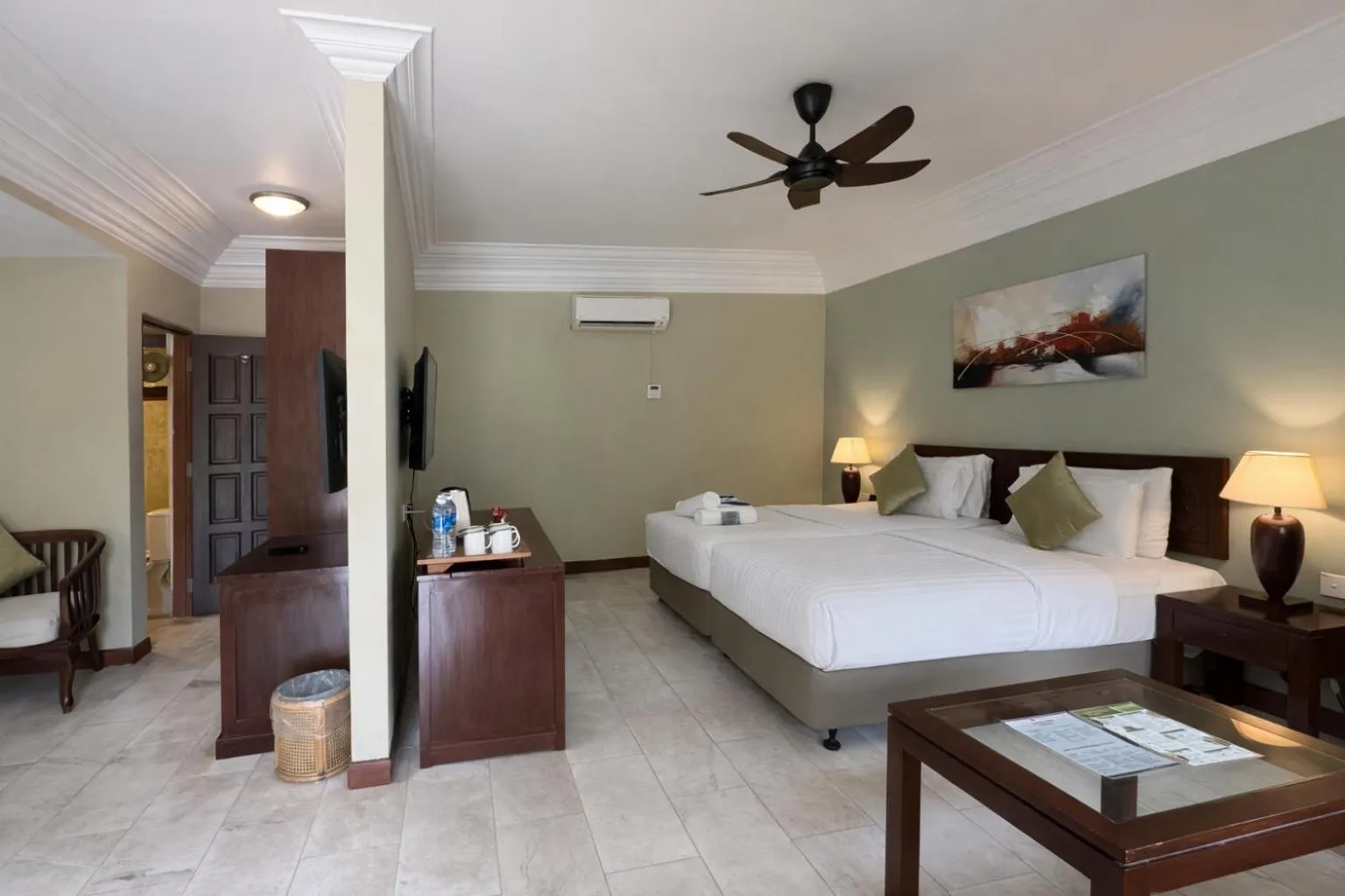 Bed in Frangipani Langkawi Resort