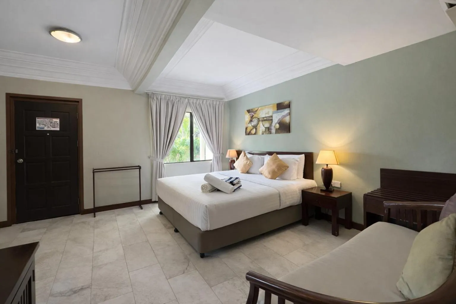 Bed in Frangipani Langkawi Resort