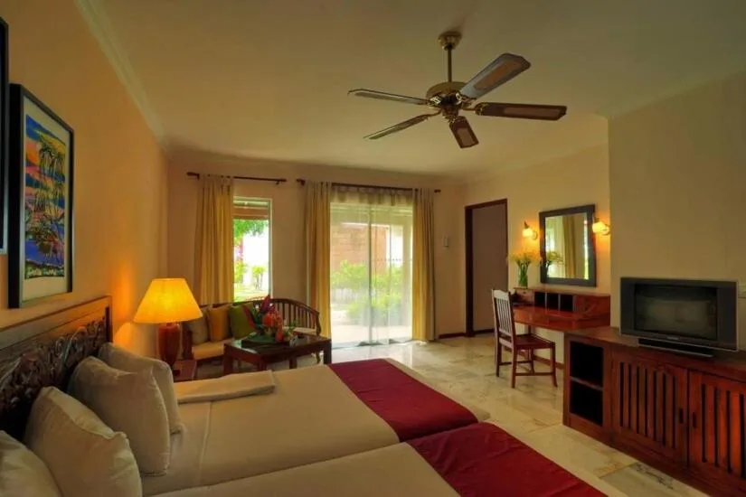 Communal lounge/ TV room in Frangipani Langkawi Resort