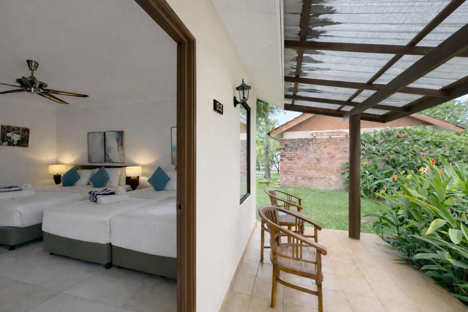 Bed in Frangipani Langkawi Resort