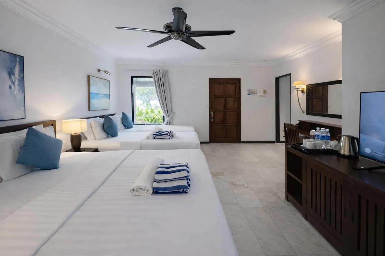 Bed in Frangipani Langkawi Resort