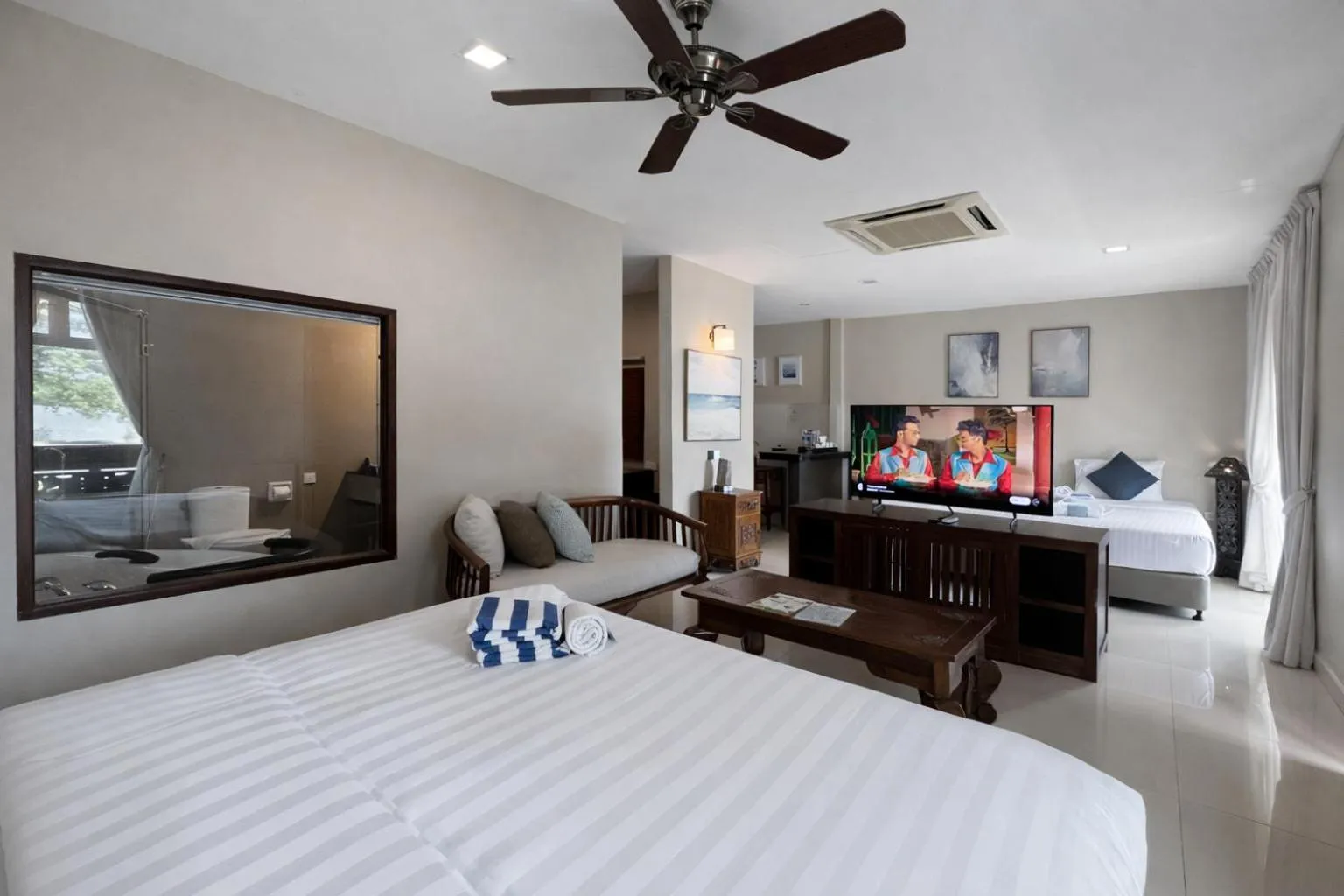 Bed in Frangipani Langkawi Resort