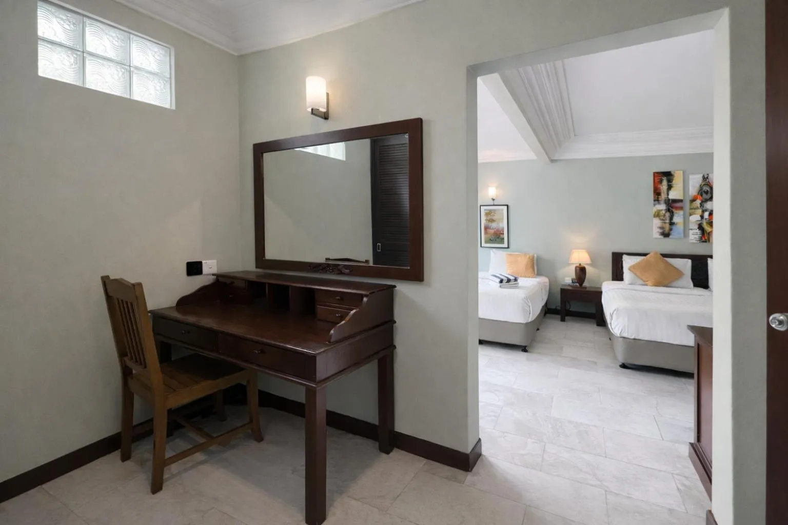 Bed in Frangipani Langkawi Resort