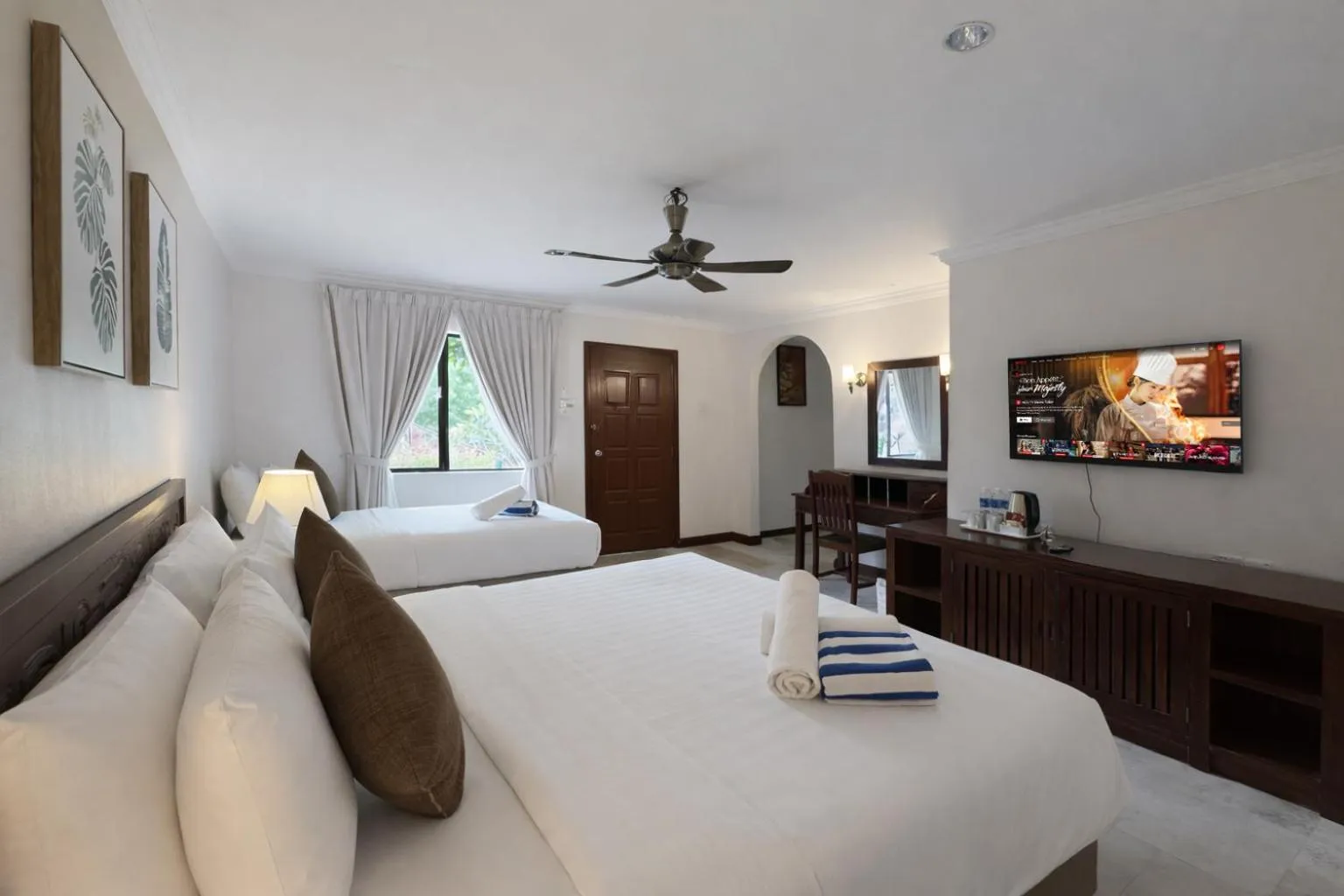 Bed in Frangipani Langkawi Resort