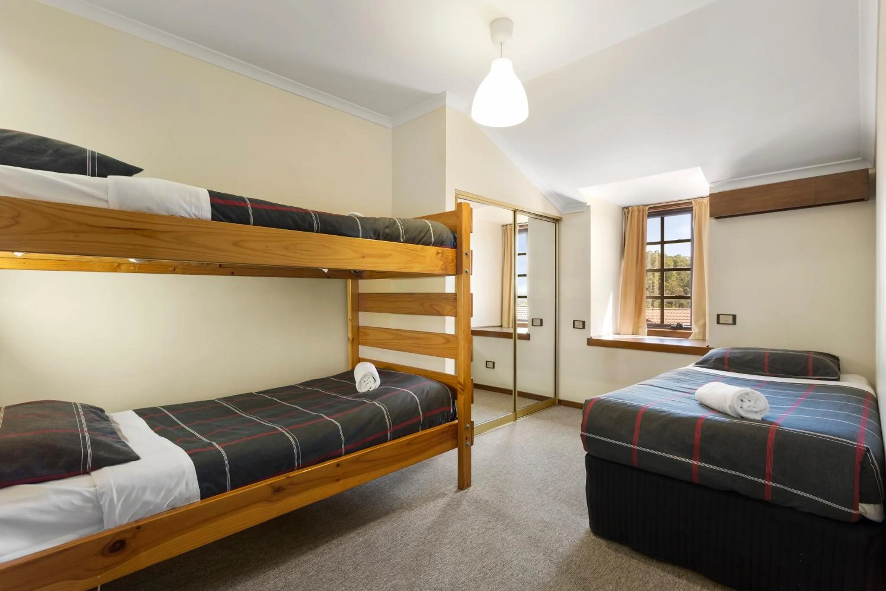 Bed in Village Family Motor Inn