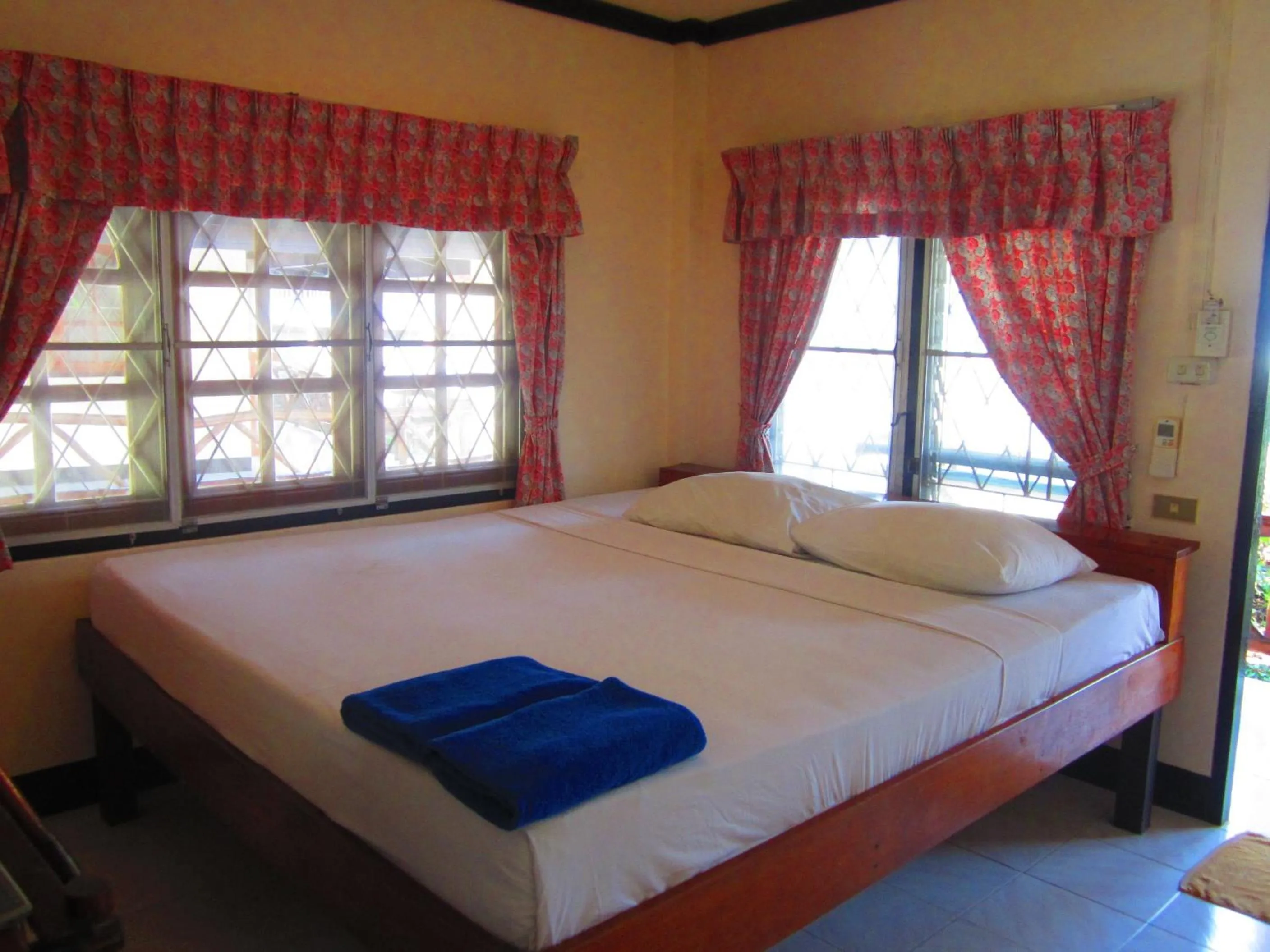 Bed in First Villa Beach Resort