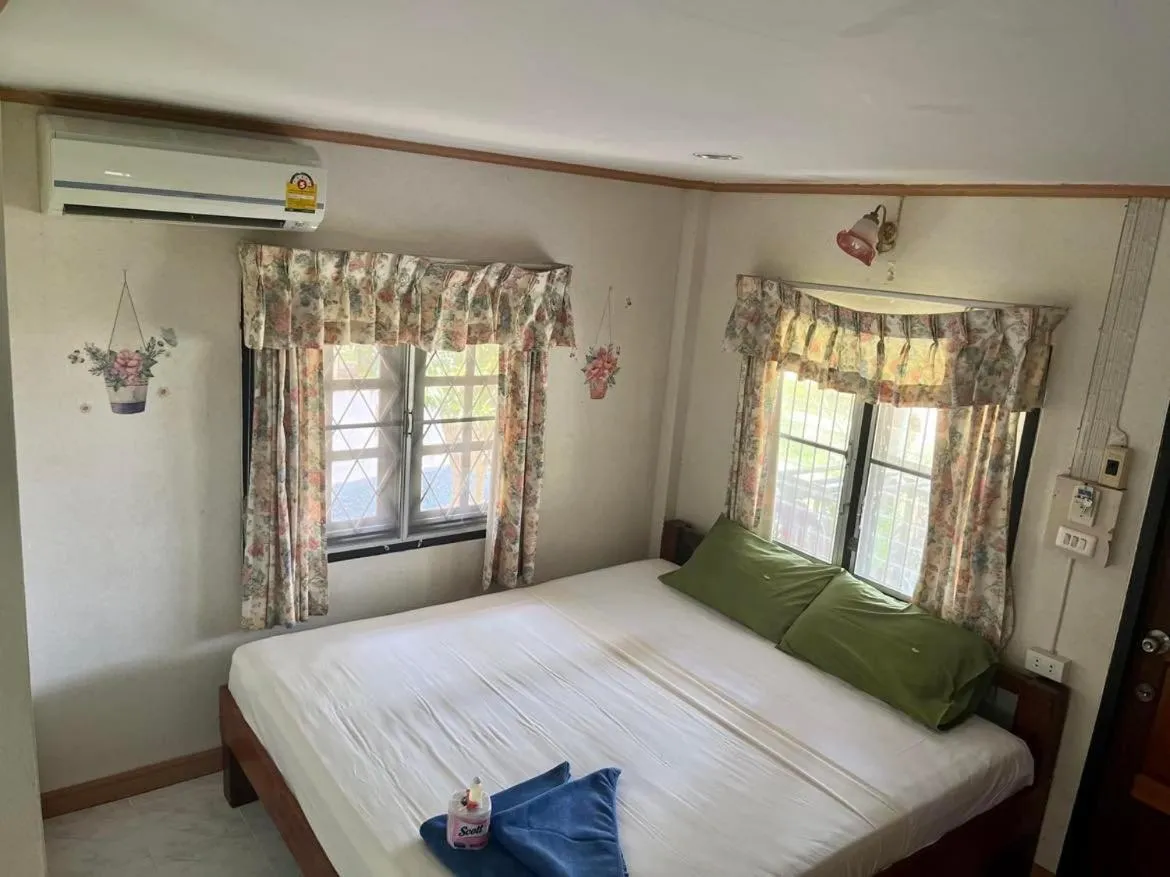 Bed in First Villa Beach Resort