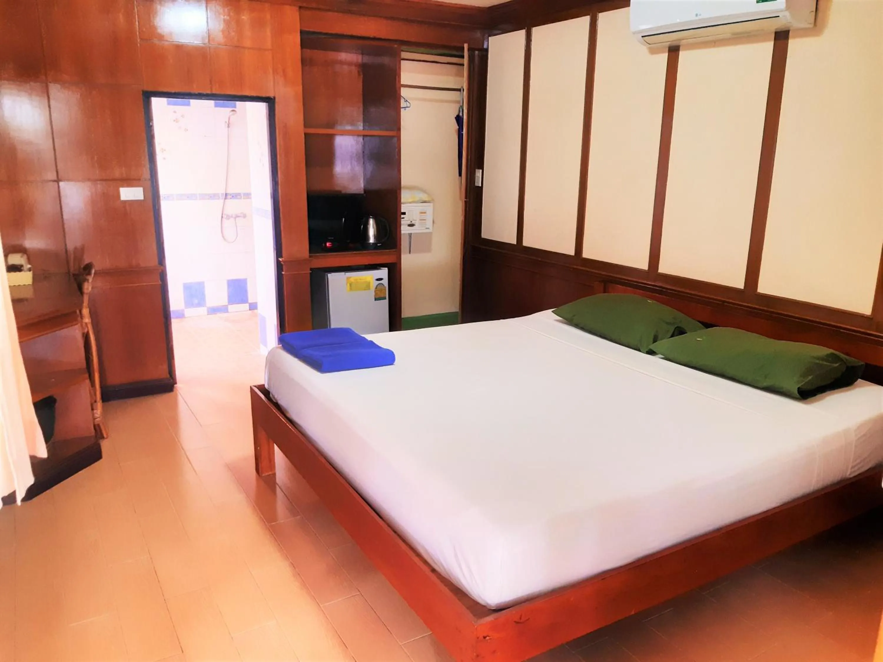 Bed in First Villa Beach Resort