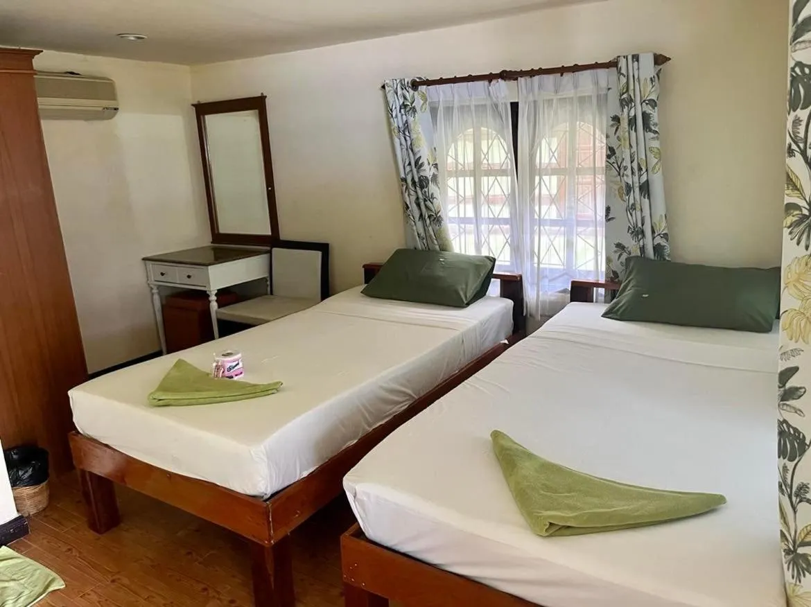 Bed in First Villa Beach Resort