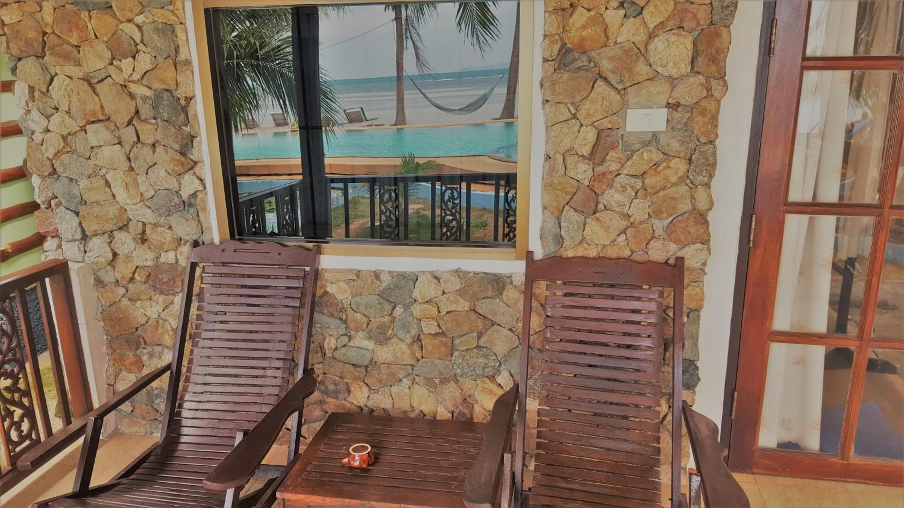 Seating area in First Villa Beach Resort