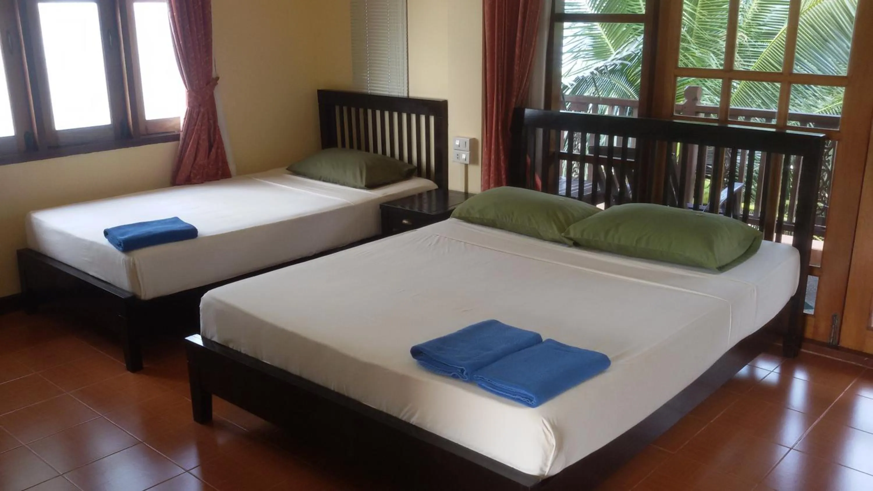 Bed in First Villa Beach Resort
