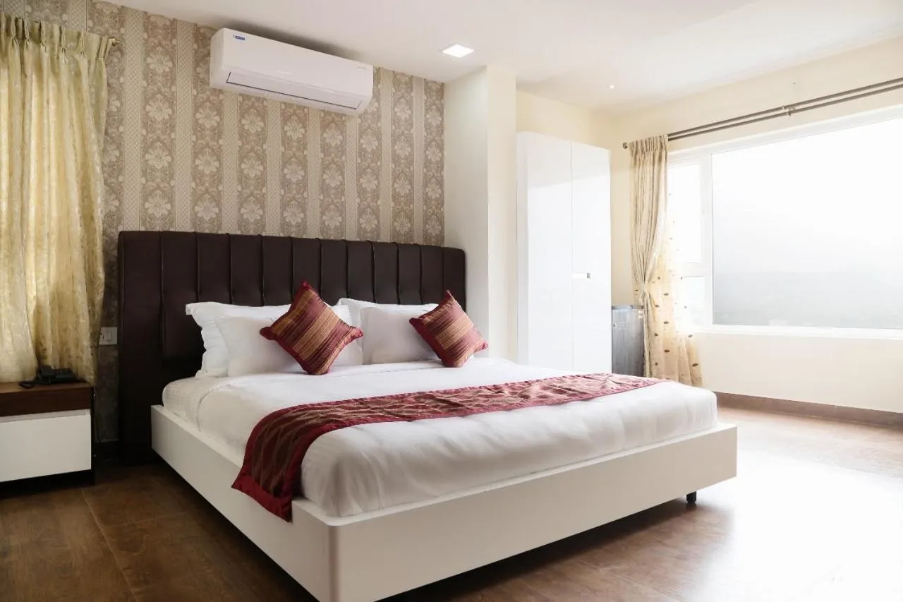 Photo of the whole room in Hotel Blue Pearl Chikmagalur