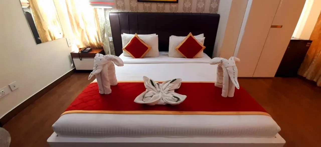 Bed in Hotel Blue Pearl Chikmagalur