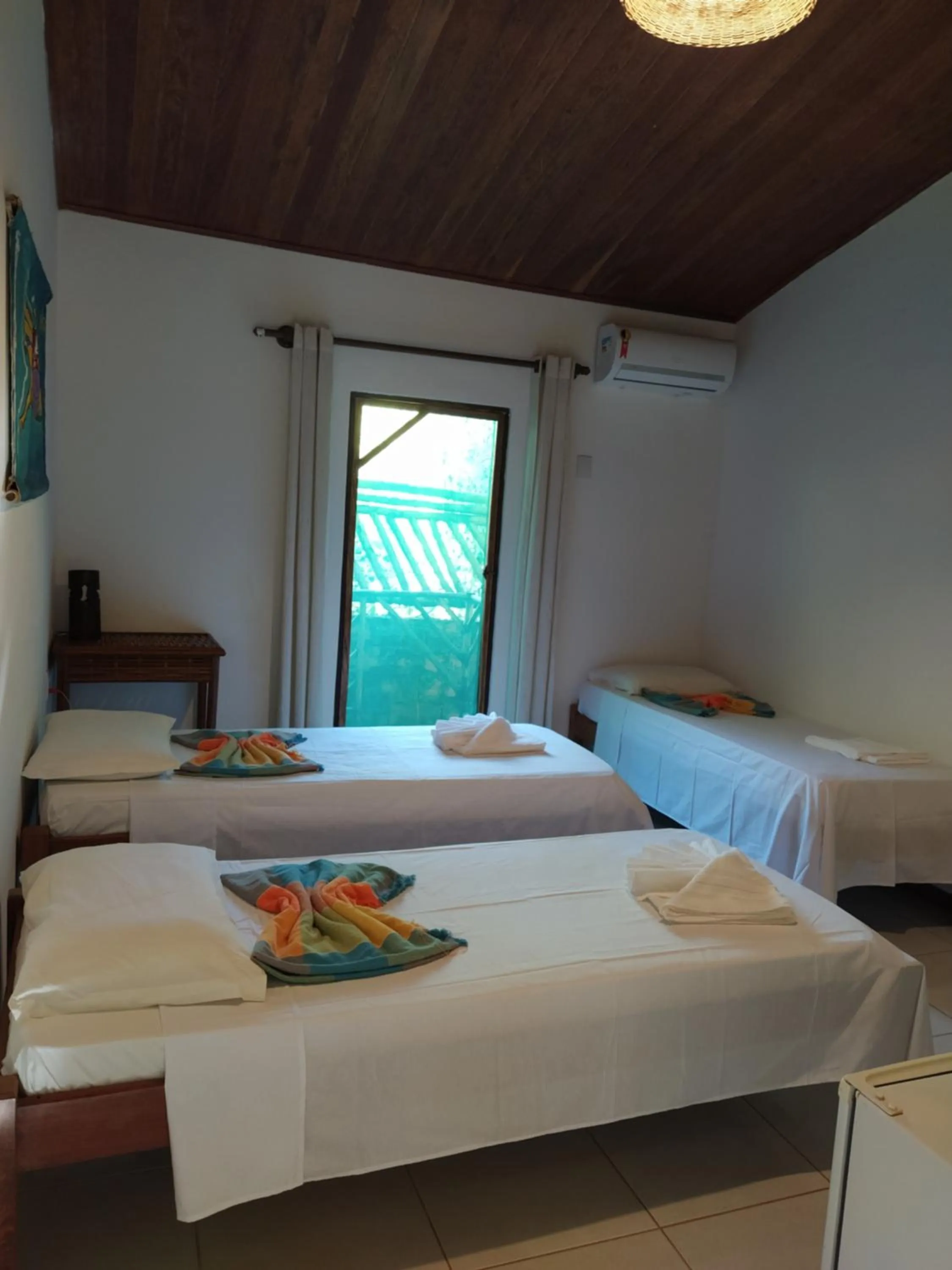 Bed in Pousada Canto De Imbassai