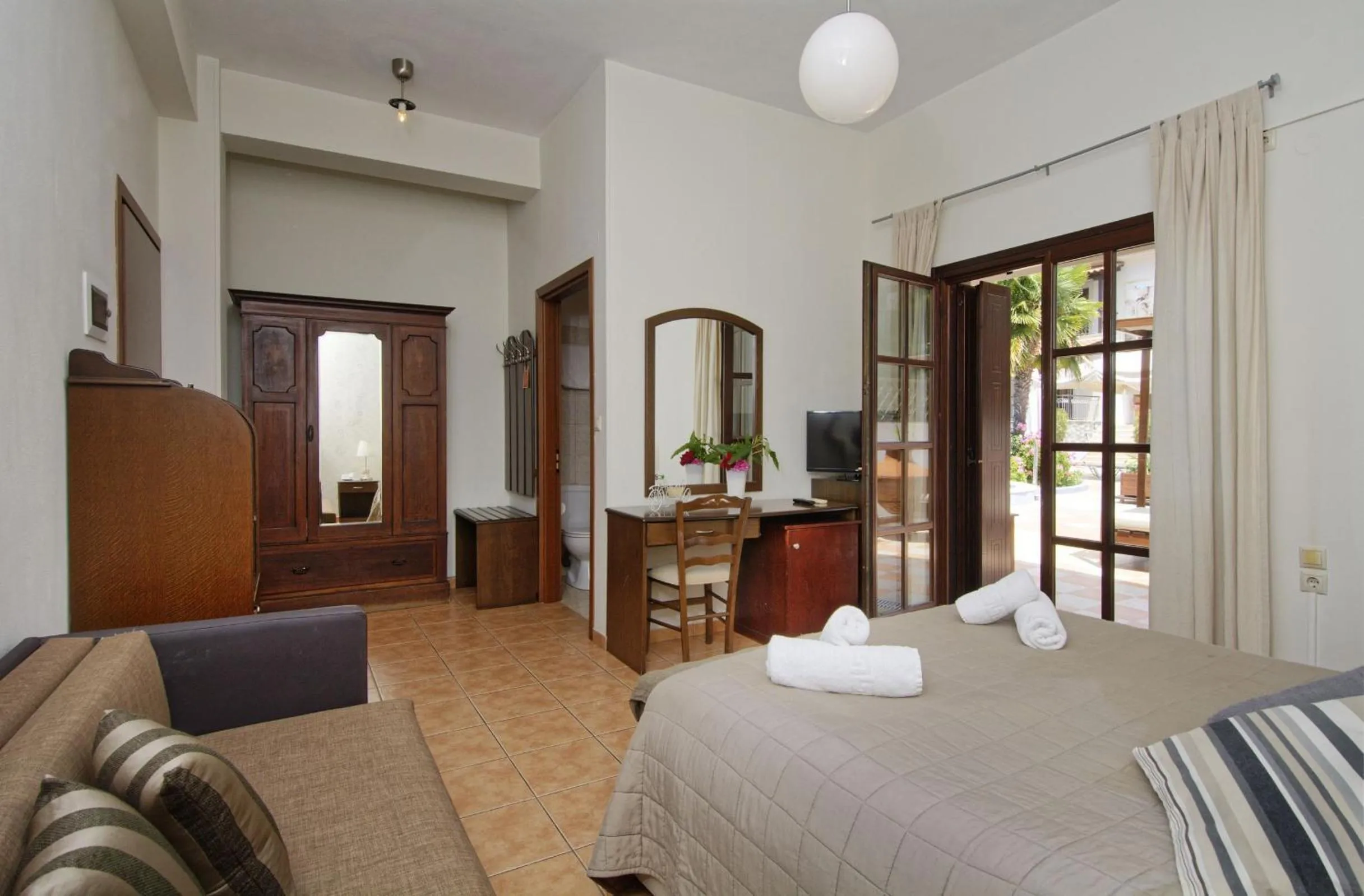 Bed in Enalion Hotel