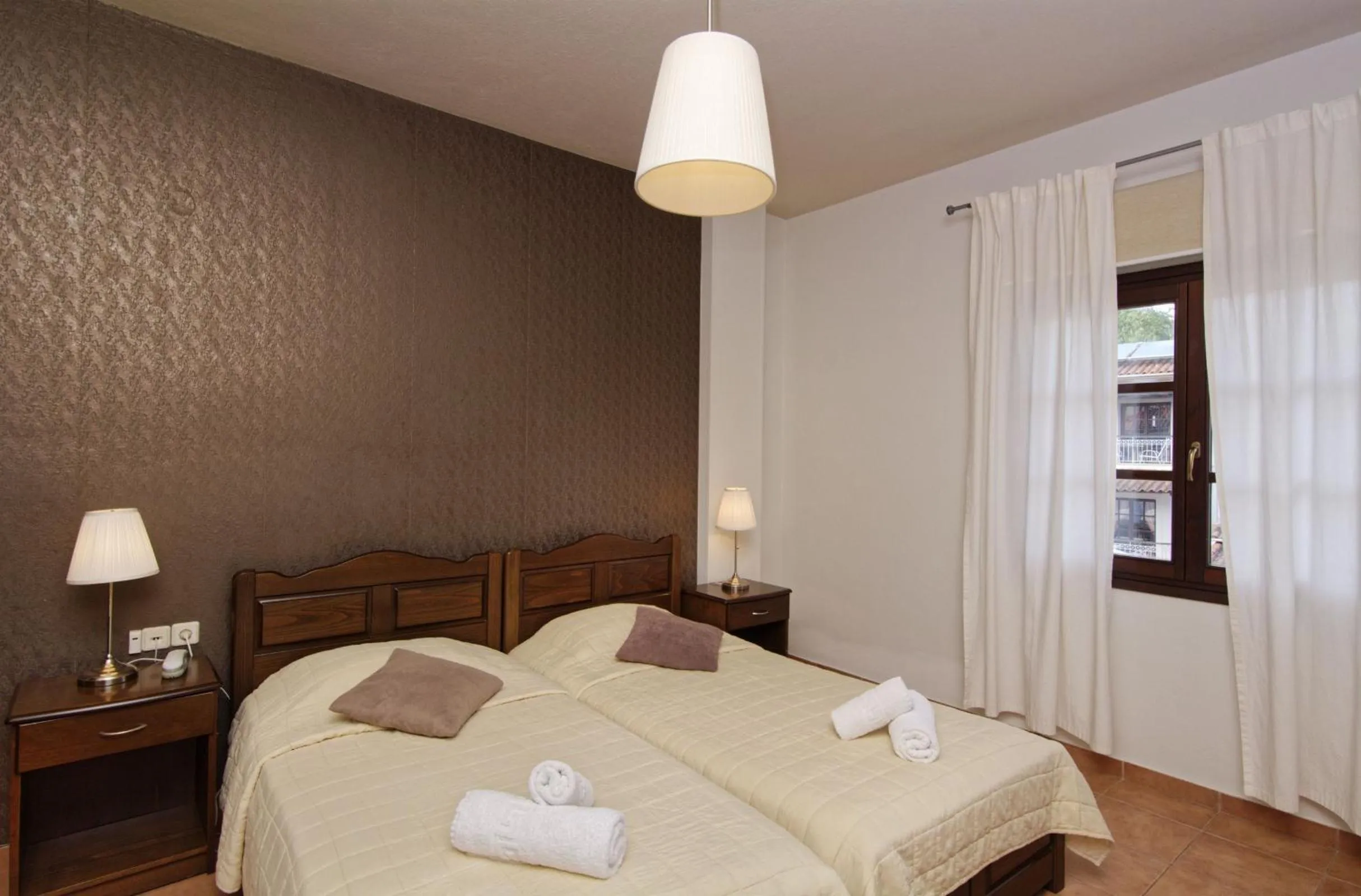 Bed in Enalion Hotel