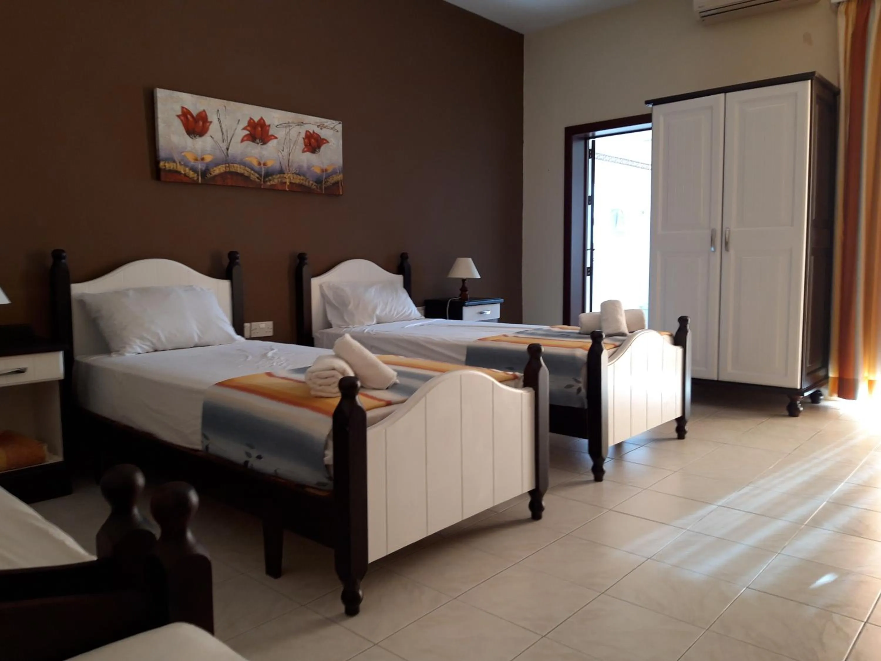 Bed in Mariblu Hotel