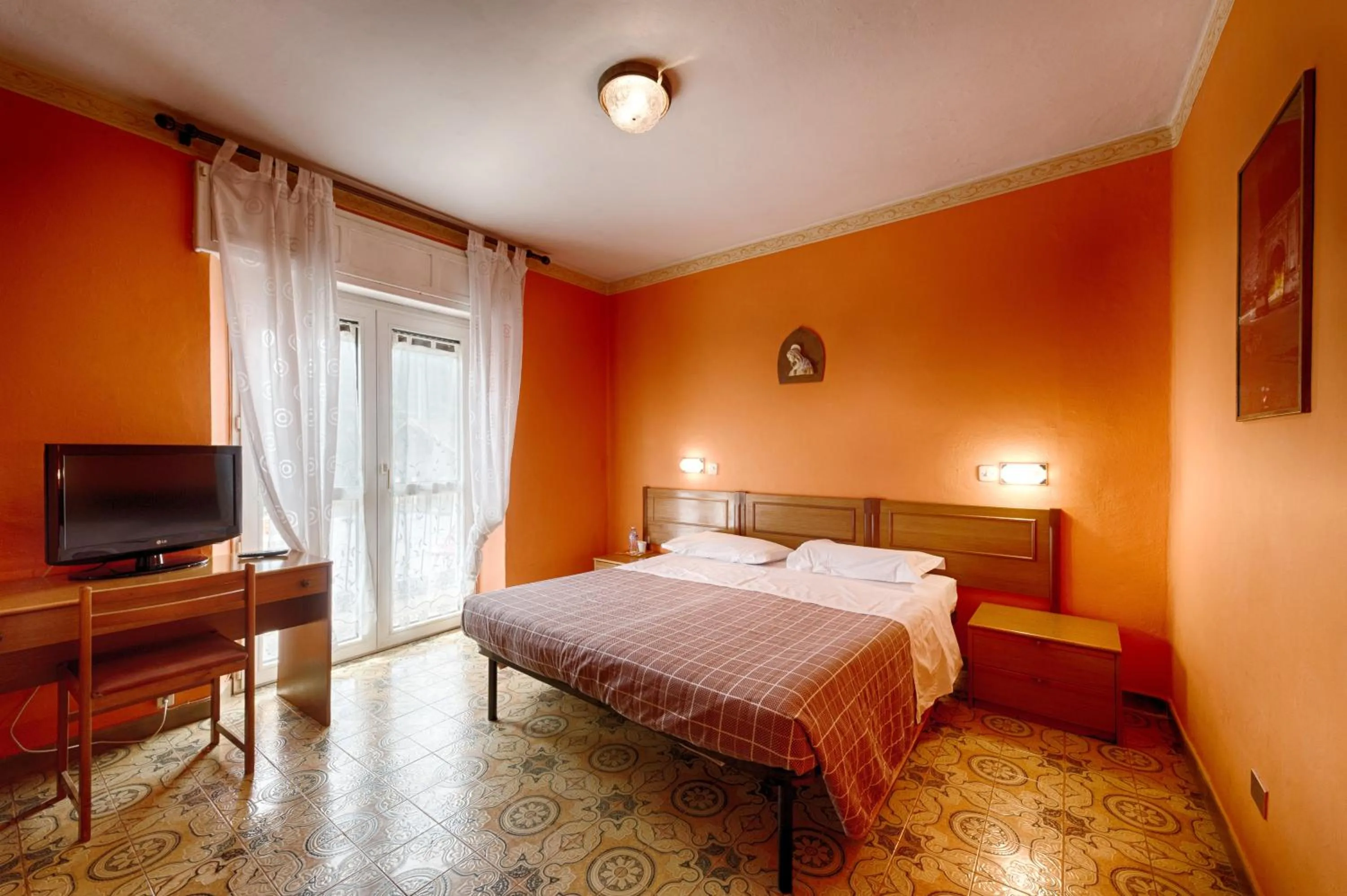 Photo of the whole room, Bed in Albergo Mancuso del Voison