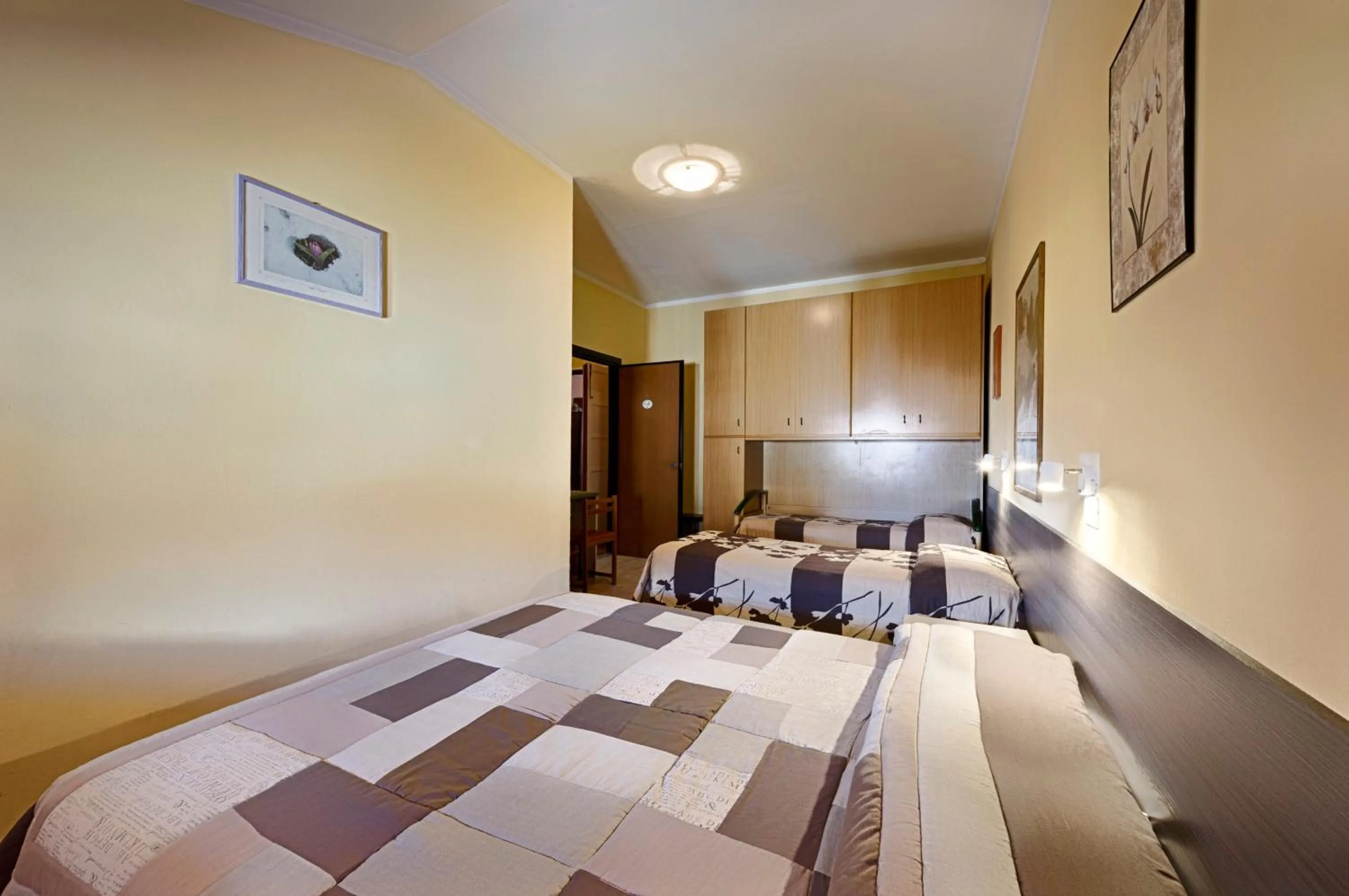 Bed in Albergo Mancuso del Voison