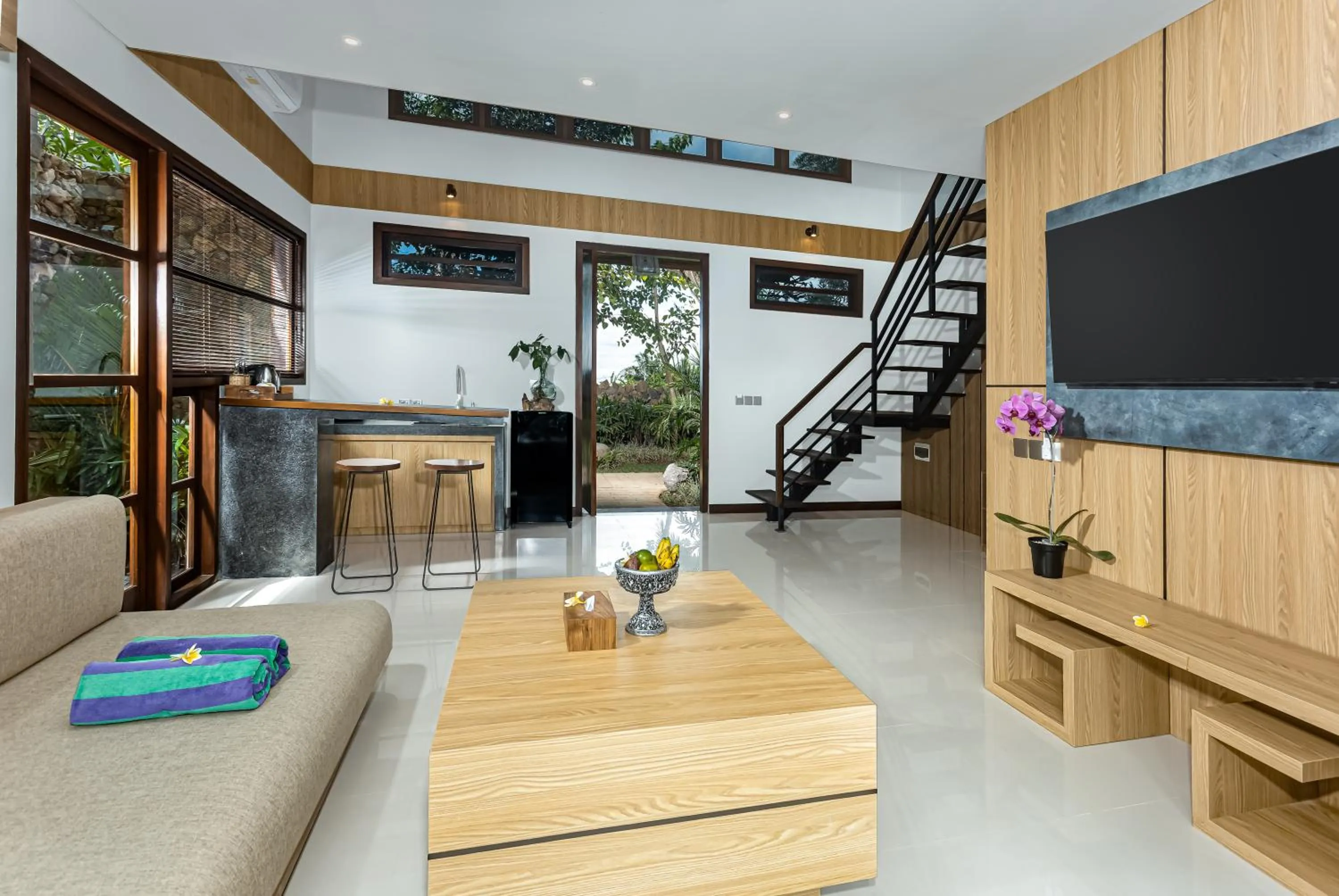 Communal lounge/ TV room in Candy Villa by GenuineHost