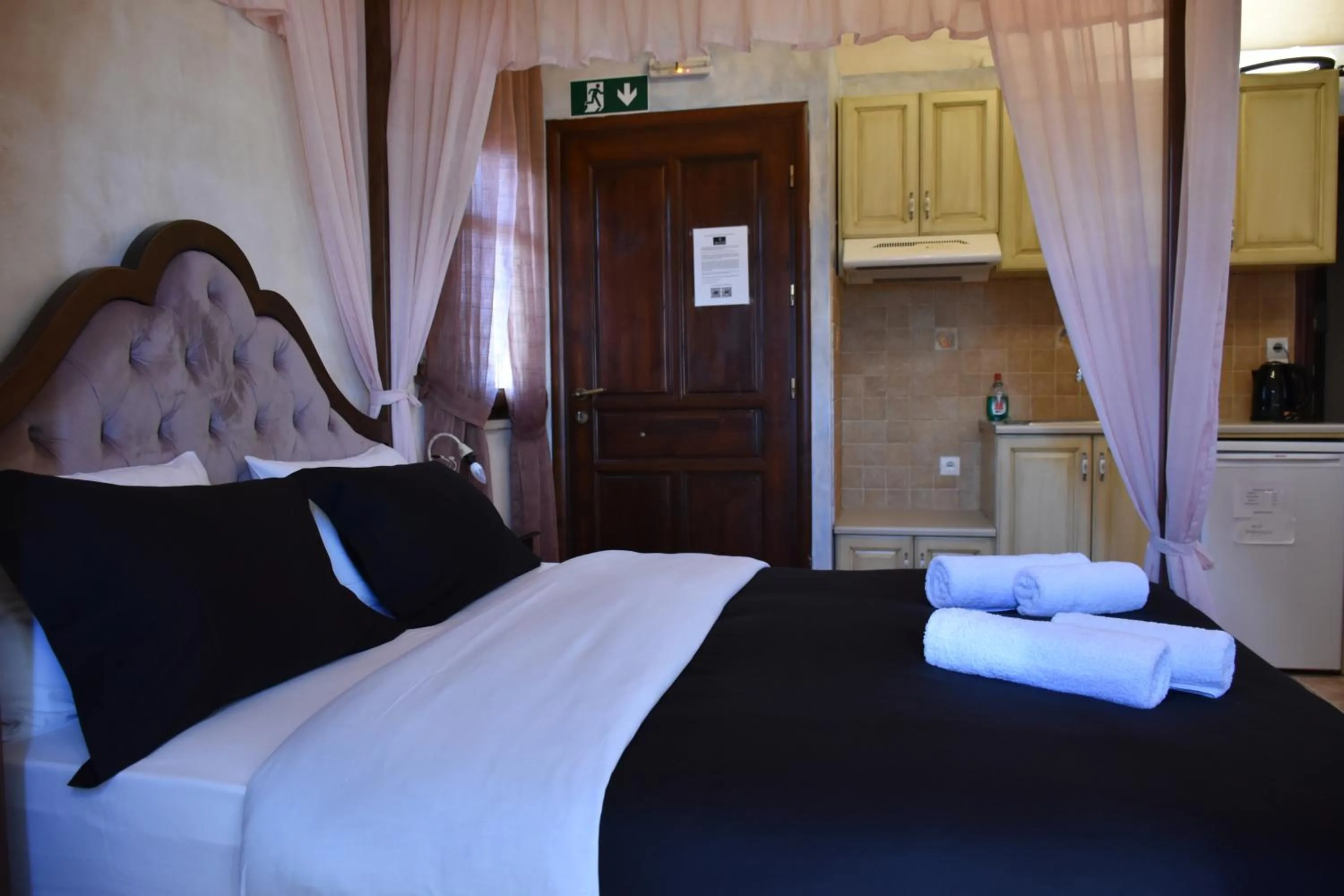 Bed in Odos Oneiron Boutique Hotel