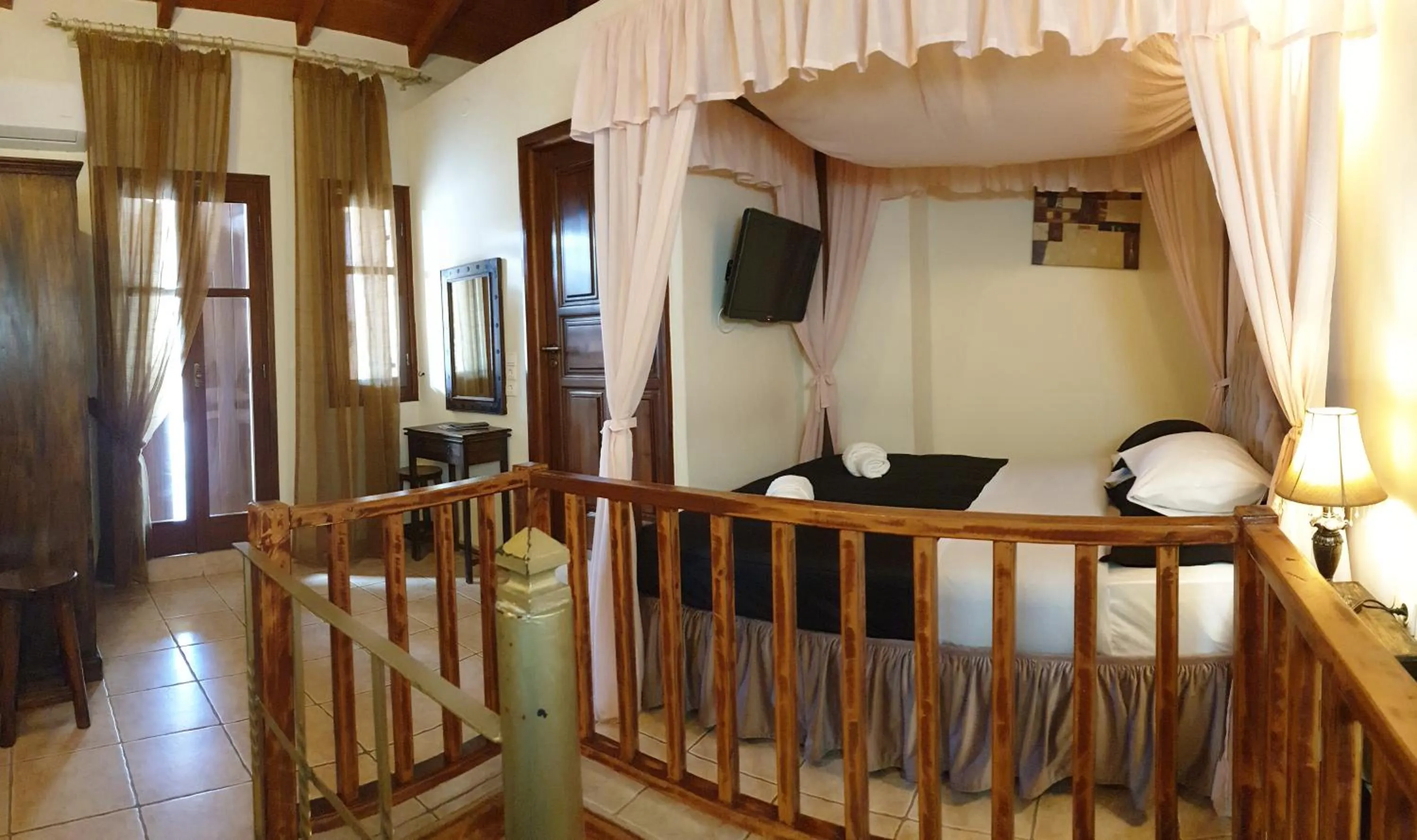 Bed in Odos Oneiron Boutique Hotel