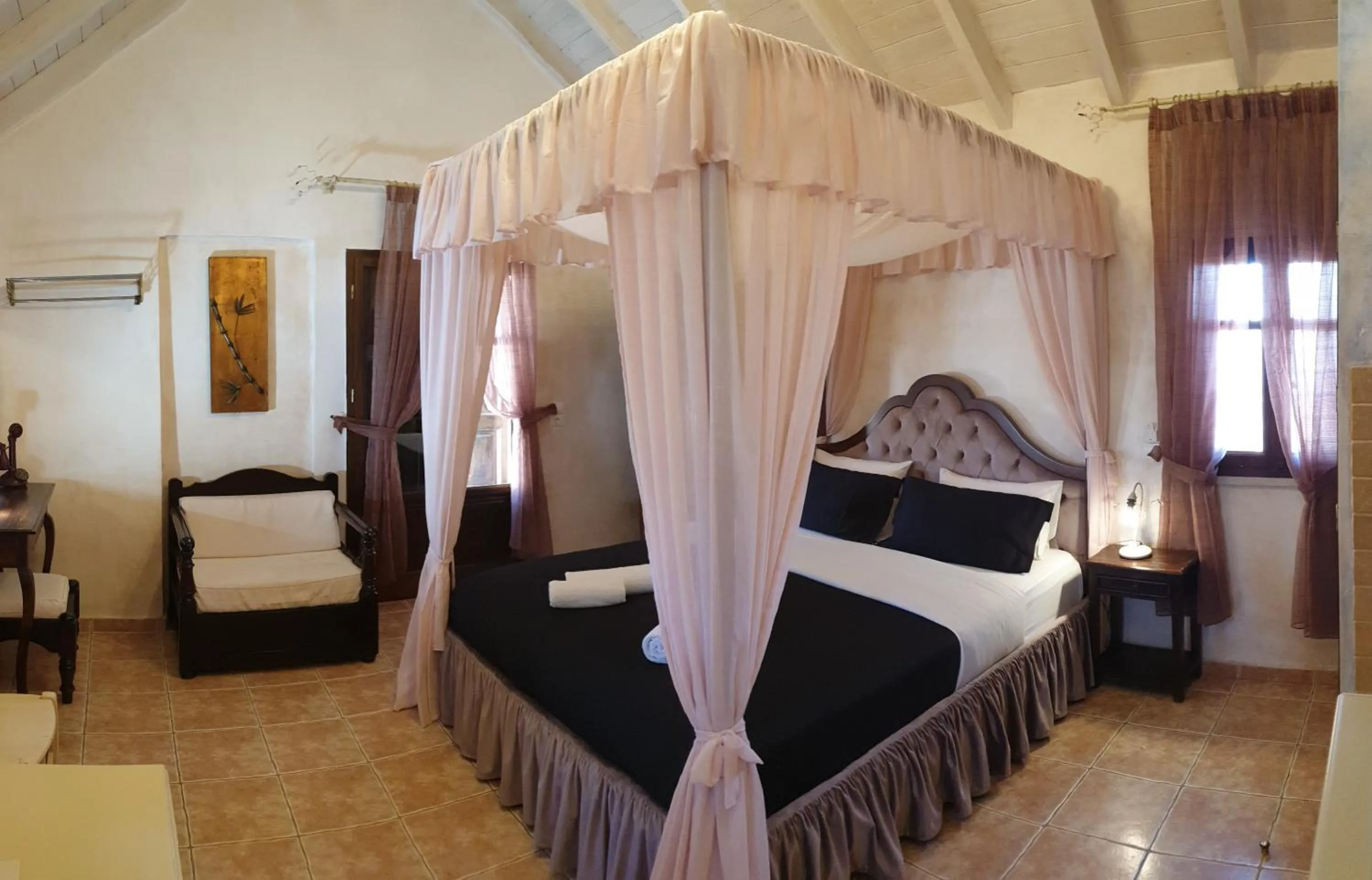 Bed in Odos Oneiron Boutique Hotel