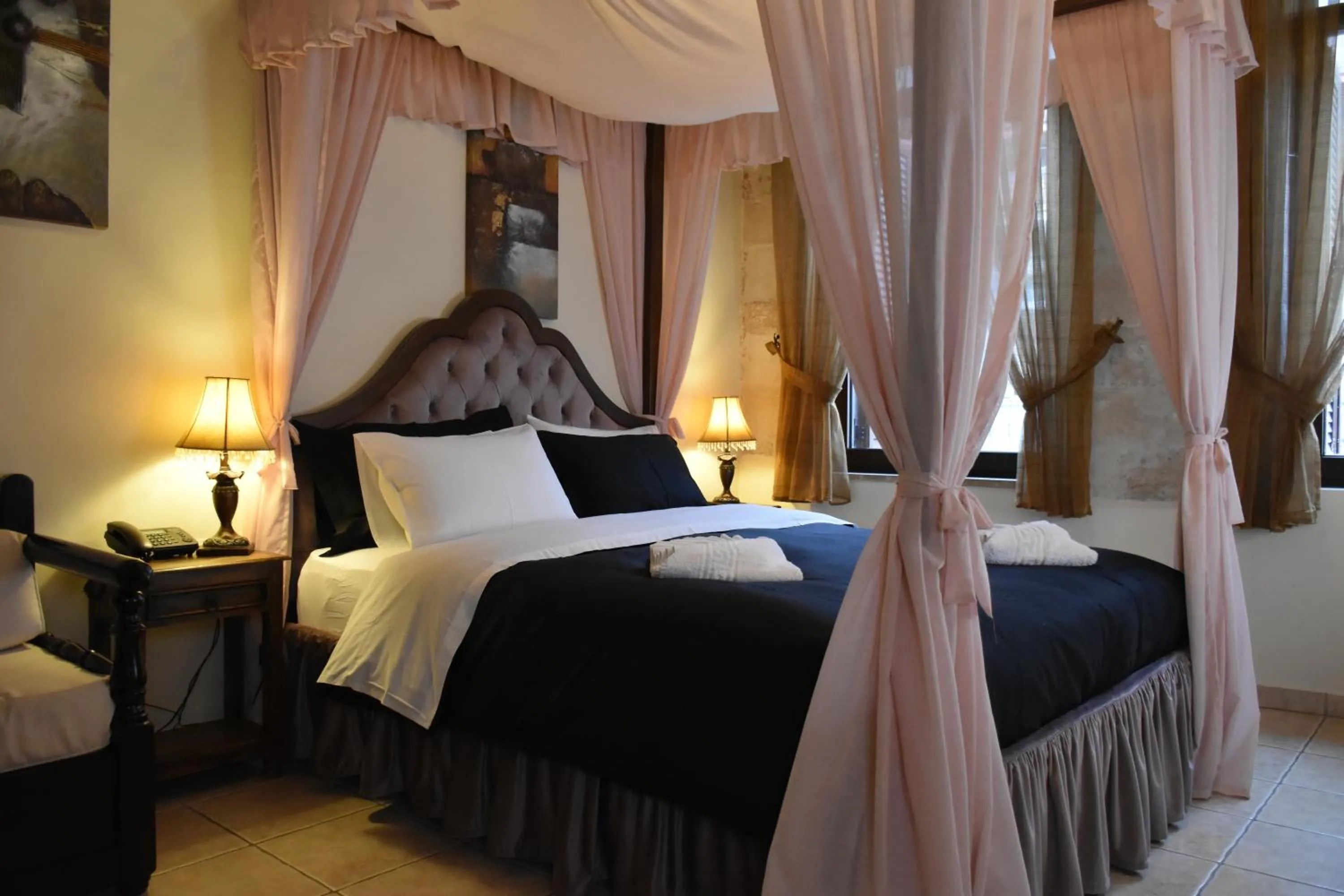 Bed in Odos Oneiron Boutique Hotel