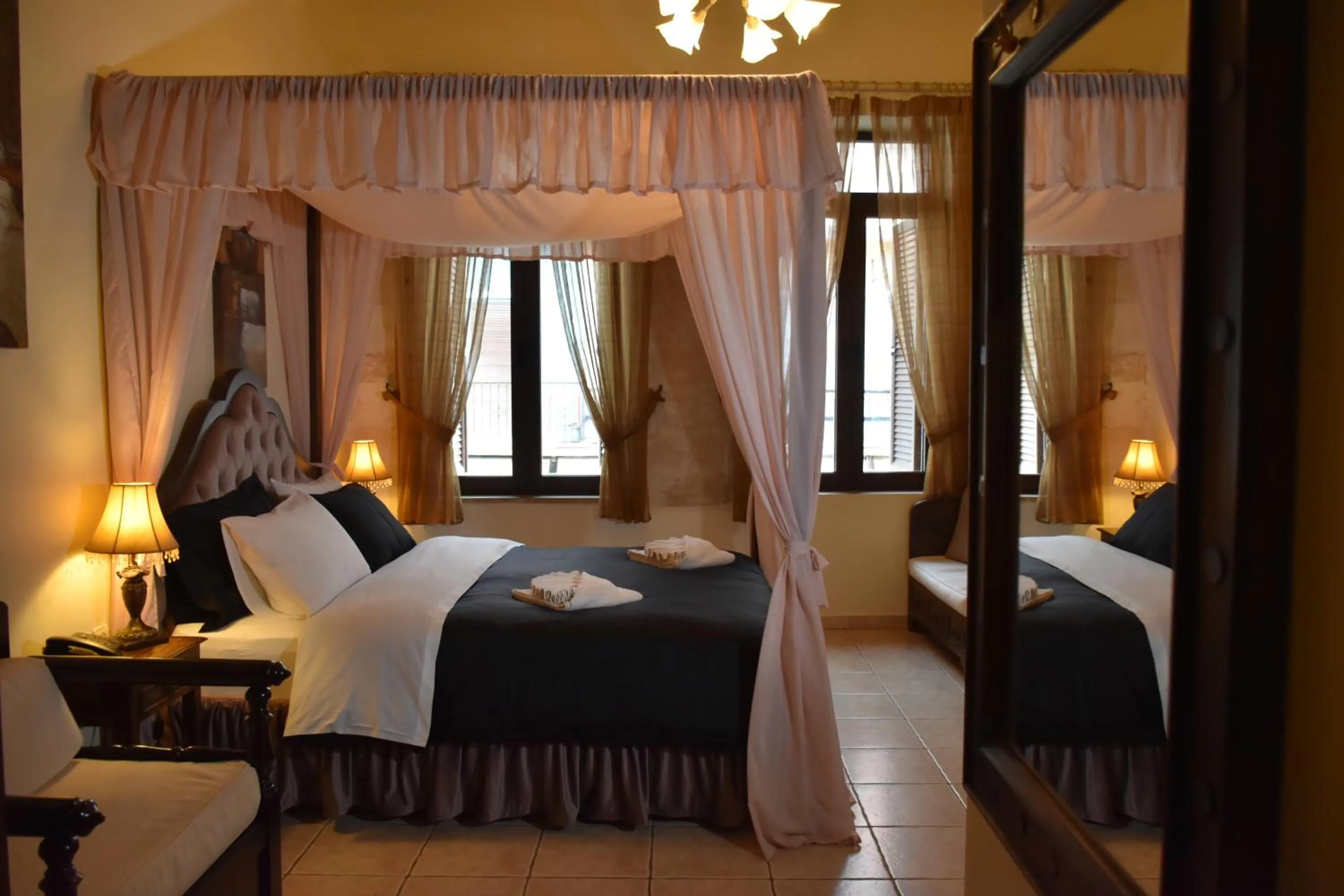 Bed in Odos Oneiron Boutique Hotel