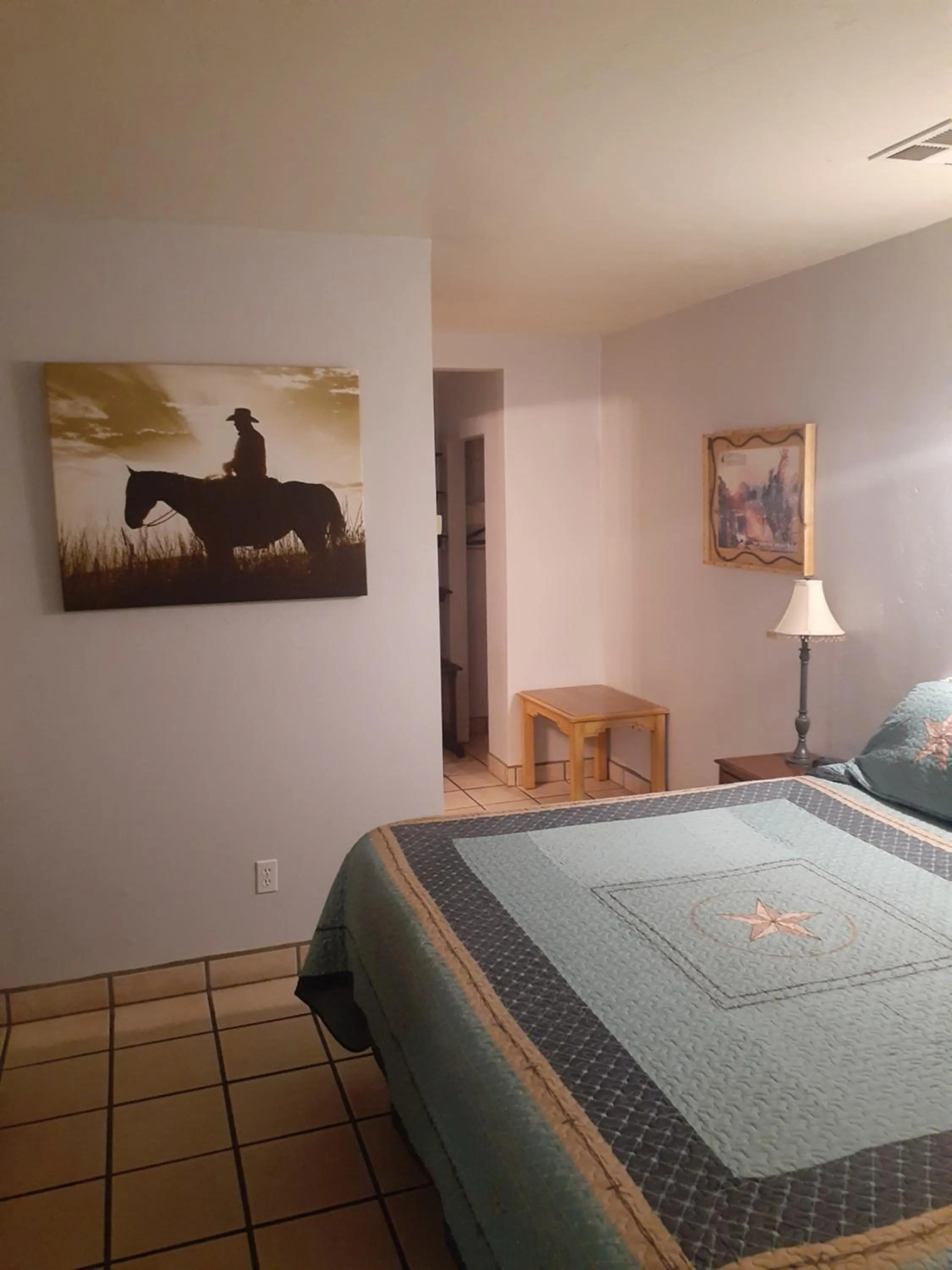 Bedroom in Stagecoach Suites