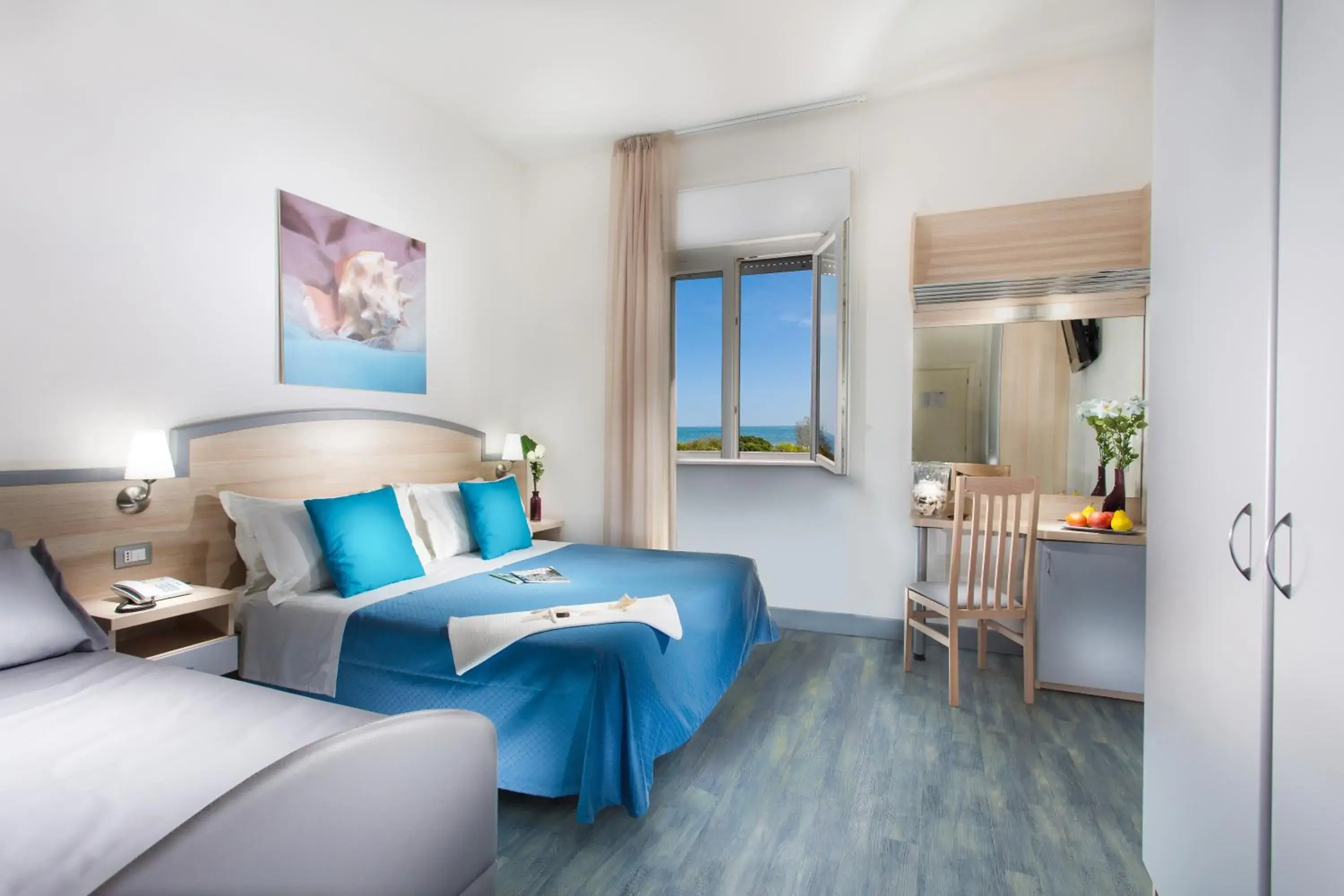 Triple Room in Hotel Beau Soleil Triple Room in Hotel Beau Soleil