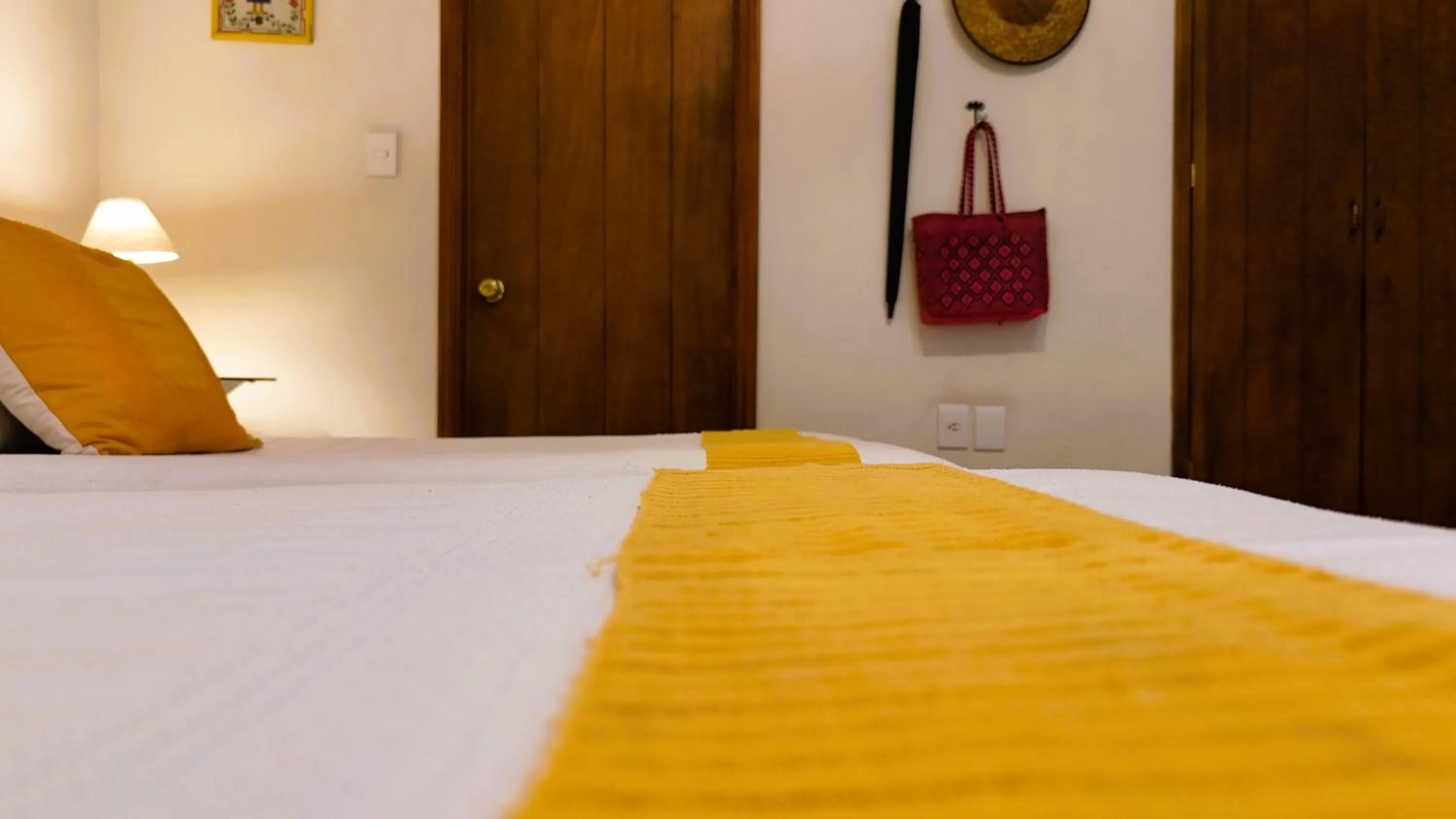 Bed in El Diablo y la Sandia B&B