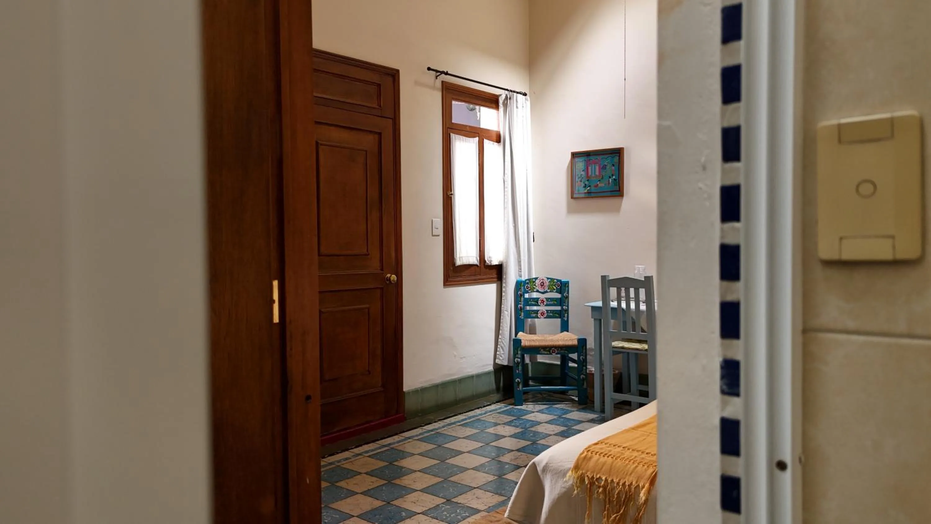 Bed in El Diablo y la Sandia B&B