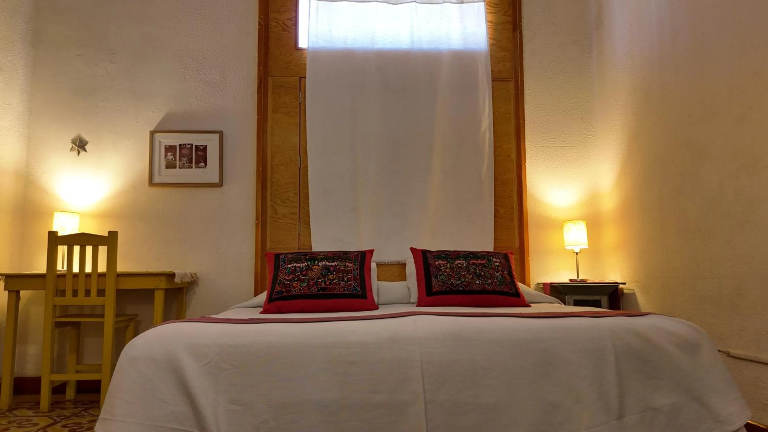 Bed in El Diablo y la Sandia B&B