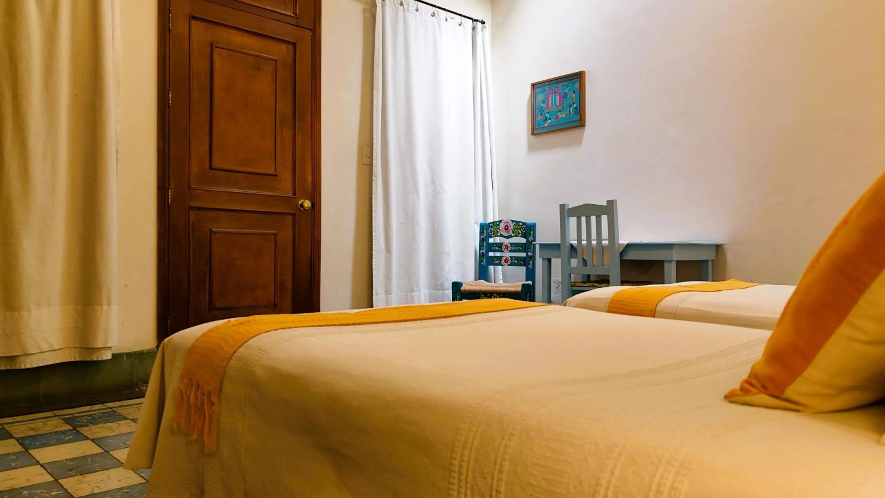 Bed in El Diablo y la Sandia B&B