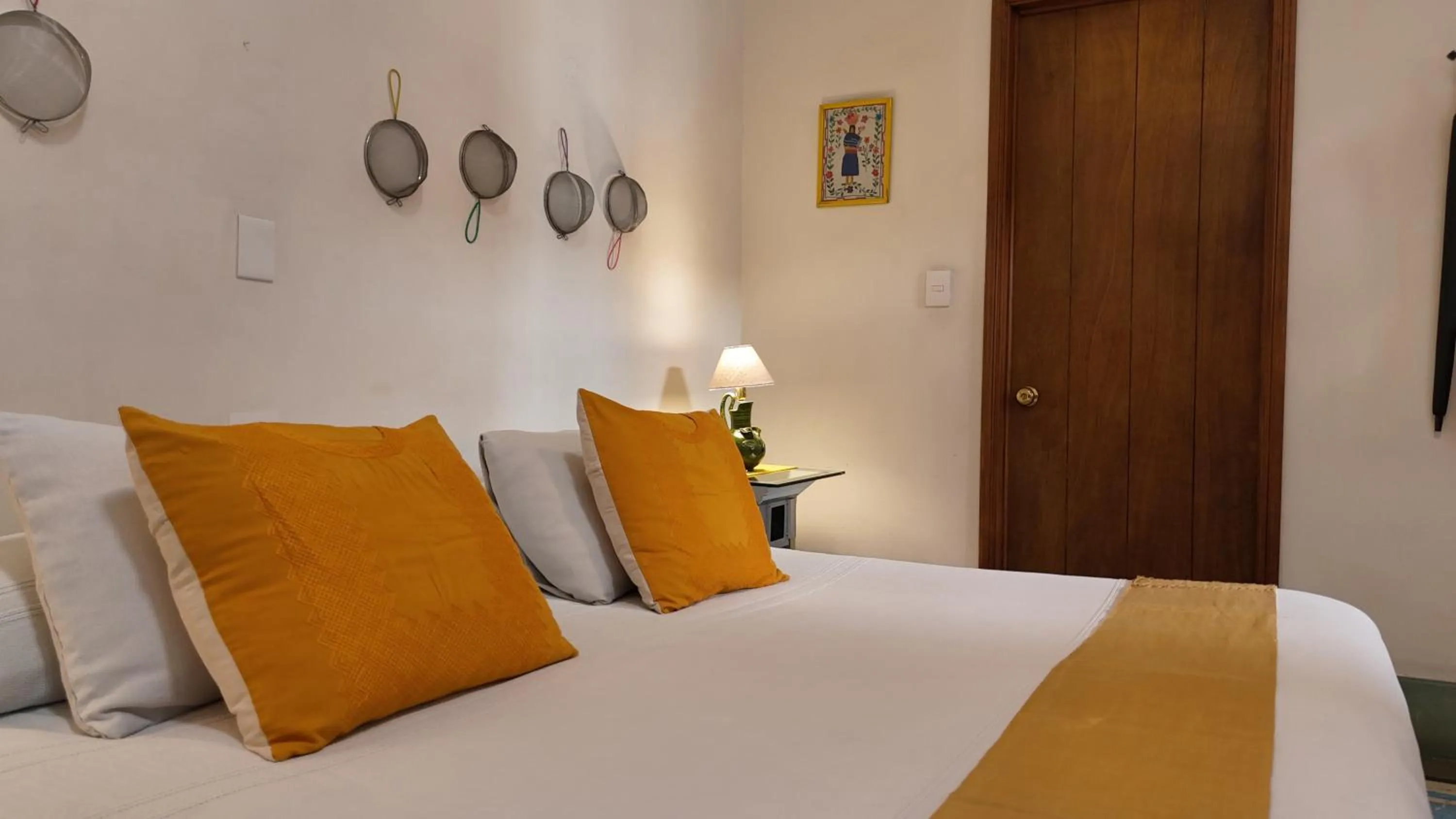 Bed in El Diablo y la Sandia B&B