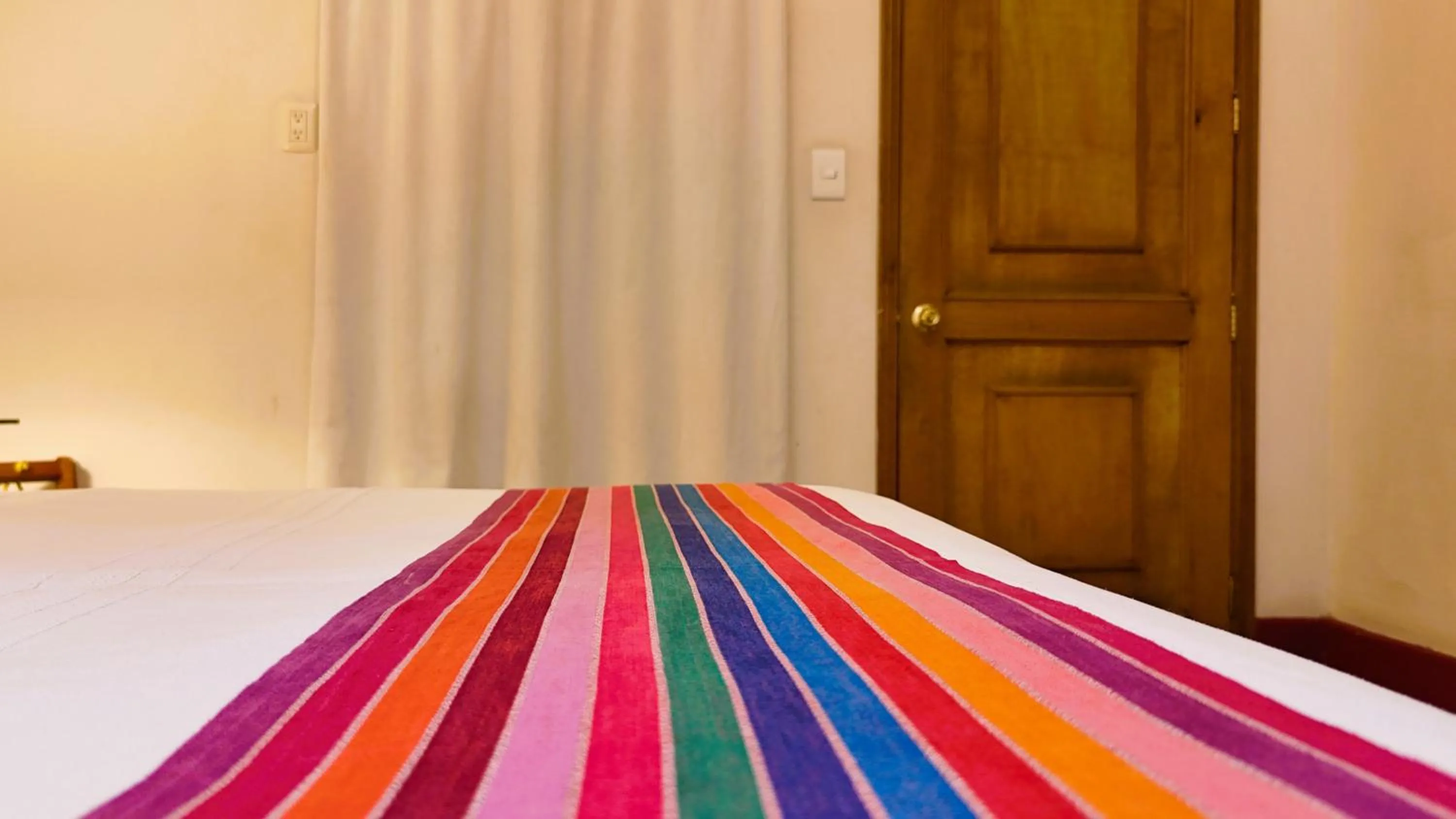 Bed in El Diablo y la Sandia B&B