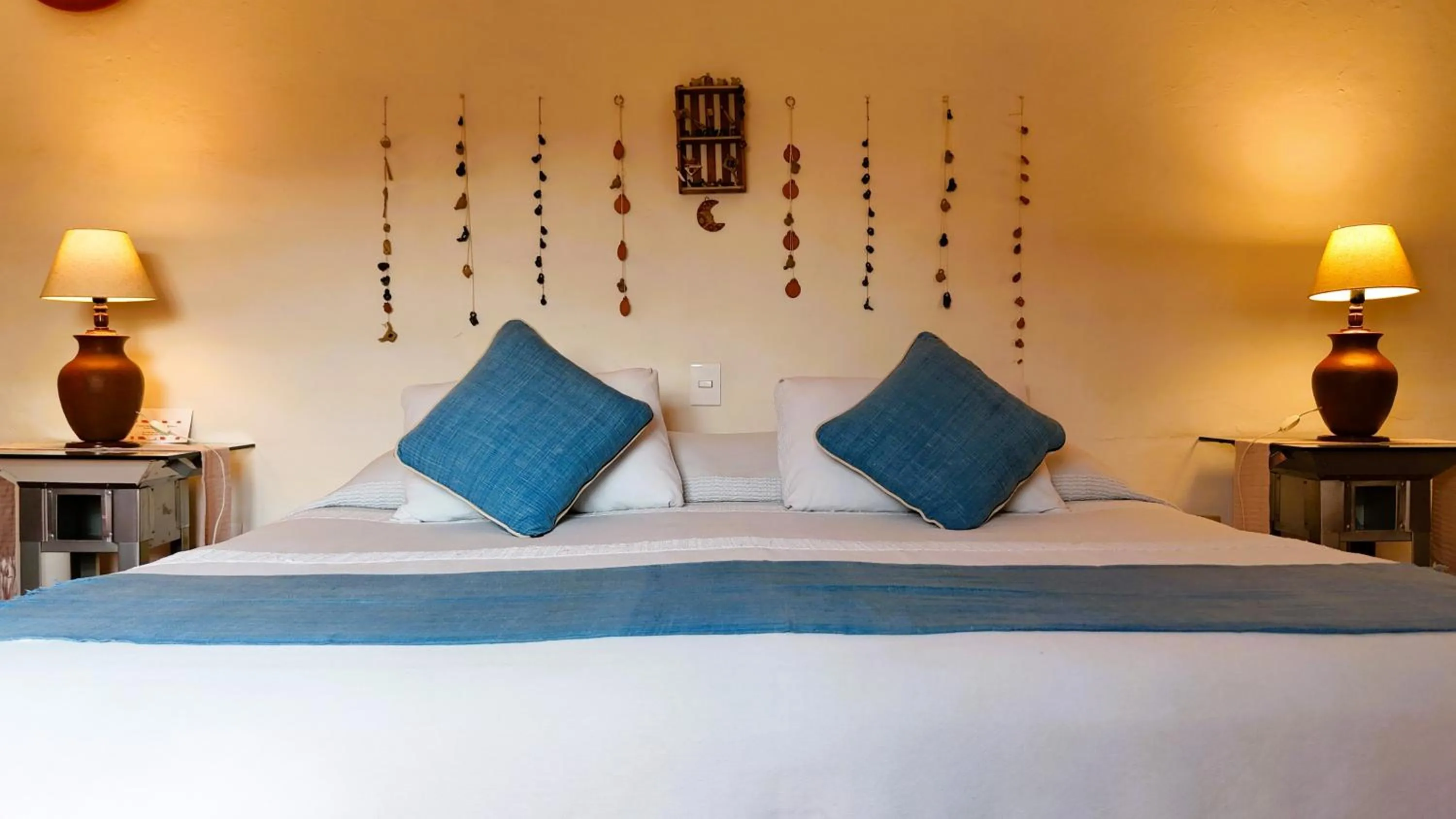 Bed in El Diablo y la Sandia B&B